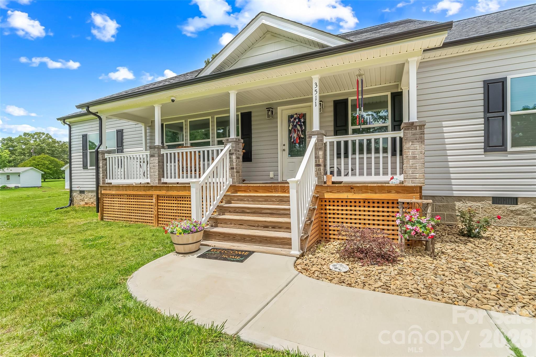 ***Escape the HOA rules and embrace true freedom on your own private acre! ***
Welcome to your own slice of country paradise! Situated on a sprawling, unrestricted 1-acre lot with no HOA, this beautiful 3-bedroom, 2-bathroom modular home perfectly blends rural charm with modern comfort. Inside, you'll find a bright, beautifully maintained interior that instantly feels like home. A standout feature is the professionally tinted windows, designed to flood the home with gorgeous natural light while keeping it incredibly cool and energy-efficient during the hot summer months.

Step outside into your fully privacy-fenced backyard—a secluded oasis ideal for relaxing or entertaining. The property also boasts a massive-detached outbuilding with limitless potential; whether you envision a workshop, home office, greenhouse, or studio, the sky is the limit! Enjoy quiet country living at its finest