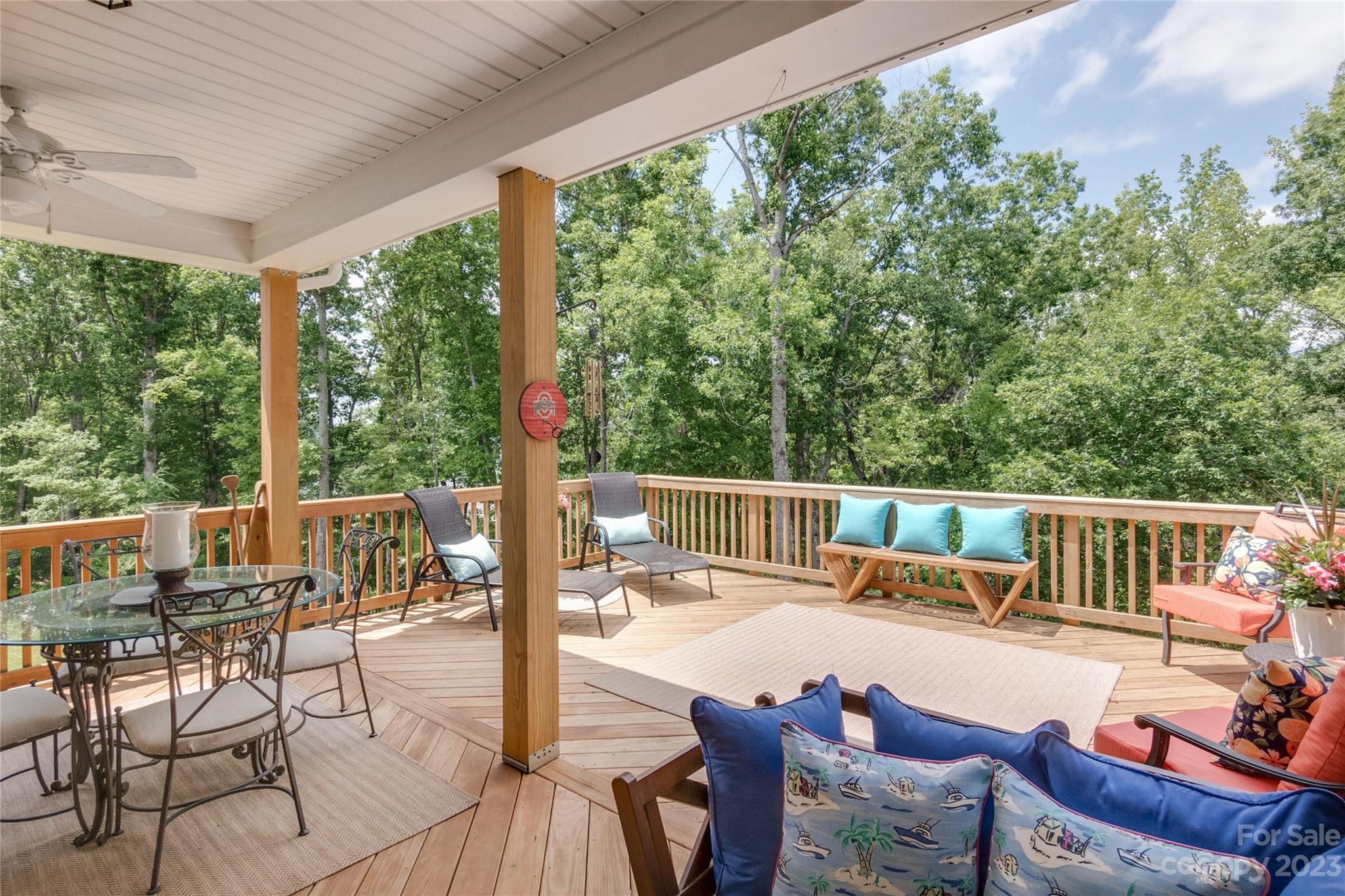Feel like you're on vacation every day in this perfectly situated basement home with serene lake views and covered porches providing awe-inspiring vistas to relax and enjoy nature & wildlife. Follow the backyard path to the lake, where you can pull your kayak, canoe or paddle board in. The basement is an exciting feature with a large recreation room, a bedroom with walk-in closet, a full bathroom and a large unfinished storage or gym area. The main floor boasts a light and bright open concept living space with a huge kitchen island, great for entertaining. In addition, the Primary Bedroom Suite is tucked away on the Main Floor with the laundry room conveniently located nearby. Upstairs features two spacious bedrooms and a full bathroom. This kind of lot, with its stunning water views, does not come available often. And there is plenty to do in this amenity-rich neighborhood including a full & fun social calendar. Don't miss the opportunity to enjoy the lake life at its best.
