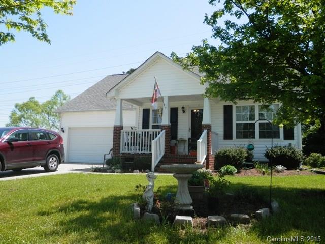 Cute as can be! One level w/ vaulted great room and kitchen! Island in kitchen with/ view of backyard. Spacious laundry room. Corner fireplace.*County Water and Sewer.