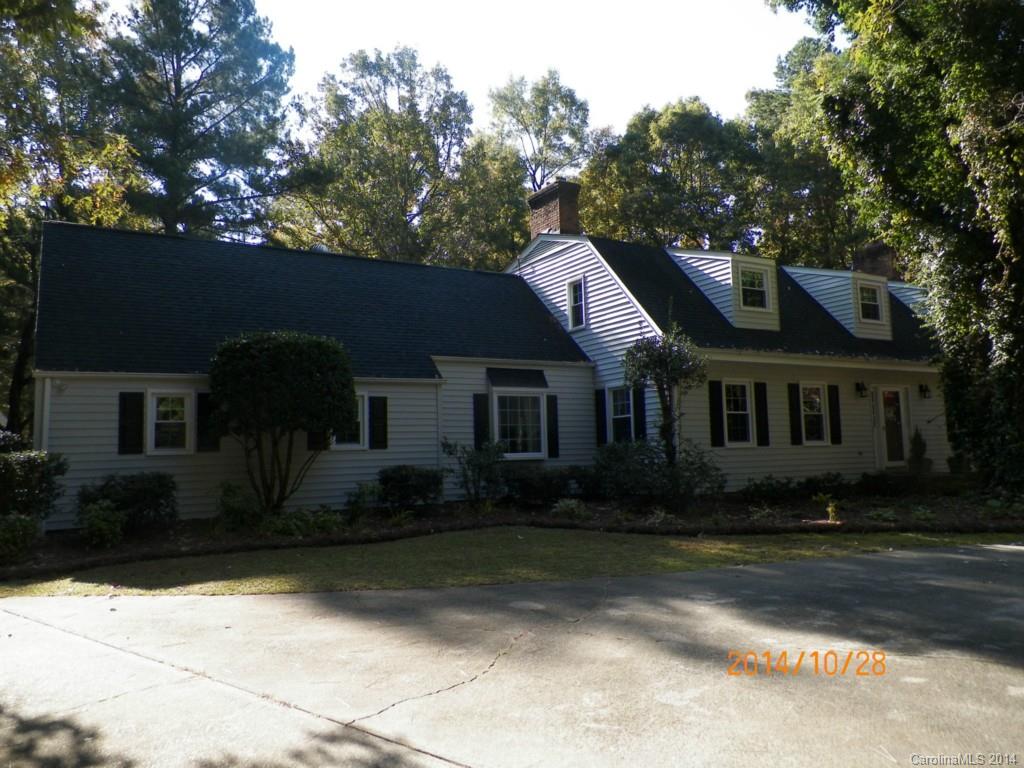 This Williamsburg style two story home on 5.8 acres is a rare opportunity on one of Pageland's most desirable streets.  Updated with newer vinyl siding, windows, and roof, the outside is in like new condition.  The inside has new wood floors, granite counter tops, and many other custom features.  The interior is a prime canvas for your custom, personal decorating choices.  The yard is a tranquil setting with large trees and shaded areas.  A large pool, hot tub, and deck complete the package.