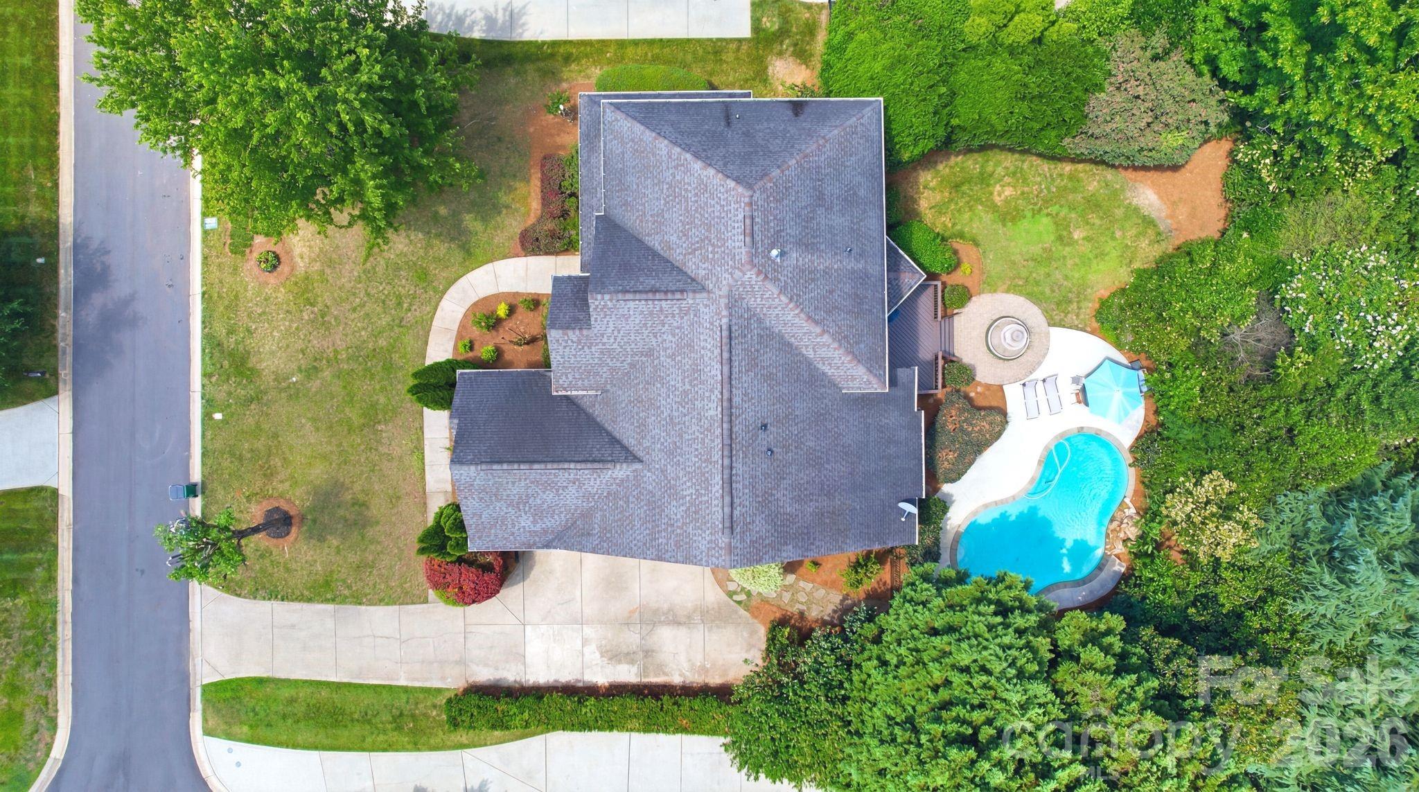 Rarely does a home like this become available in the highly sought-after Country Club Estates community! This stunning full-brick residence combines timeless elegance, exceptional space, and resort-style outdoor living in one of the area’s most desirable locations. Step through the impressive iron front door into a bright, open floor plan with a soaring two-story great room, private office, 4 bedrooms, 3.5 baths, and a spacious 3-car garage. The beautifully designed kitchen boasts a large island, while the expansive primary suite includes a private sitting area. Newly installed laminate flooring enhances the entire second level. The true showstopper awaits outdoors, a private backyard oasis featuring a gorgeous in-ground pool, perfect for relaxing, entertaining, and enjoying North Carolina’s beautiful seasons. Located just minutes from Waverly’s premier shopping, dining, and entertainment, with convenient access to I-485 and assignment to some of the area’s top-rated public schools, this is a rare opportunity to own a home that truly offers the best of luxury, convenience, and lifestyle.