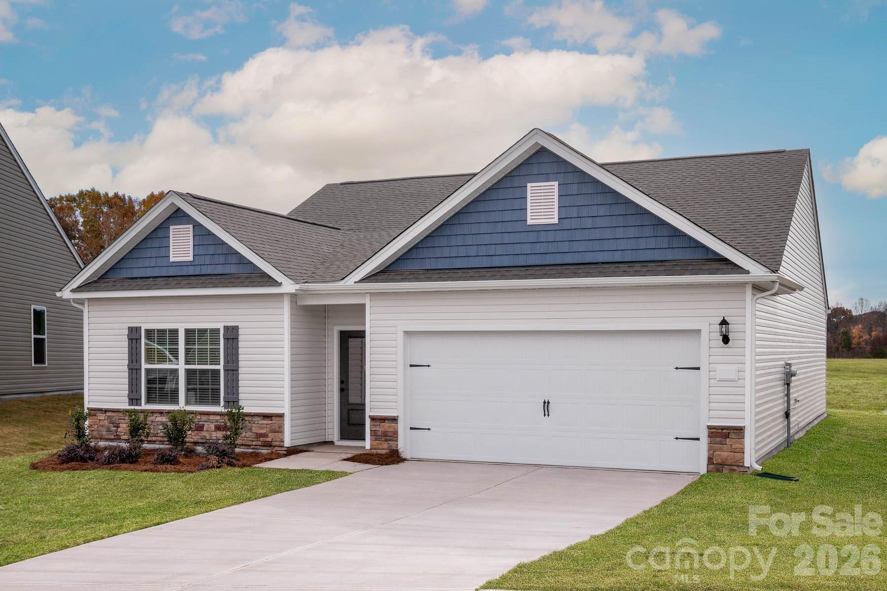 Just Listed in Winston-Salem!
Single-Story Living • Open-Concept Design • Covered Outdoor Living

Welcome home to the beautiful Cary floorplan by LGI Homes in the sought-after Robindale community! This thoughtfully designed single-story home offers 3 spacious bedrooms, 2 full bathrooms, and a bright open-concept layout that perfectly blends comfort and functionality. From the moment you walk inside, you’ll love the modern finishes, natural flow, and inviting spaces designed for both entertaining and everyday living.

The chef-ready kitchen is the heart of the home, featuring granite countertops, stainless steel Whirlpool appliances, abundant cabinet space, recessed lighting, and a large island overlooking the dining and living areas. Whether hosting guests or enjoying a quiet night at home, this open layout makes every space feel connected and welcoming.

The private owner’s suite offers a relaxing retreat with an en-suite bathroom and spacious walk-in closet, while the additional bedrooms provide flexibility for family, guests, a home office, or hobbies. Every bedroom includes generous closet space, giving you the storage you’ve been searching for.

Step outside to enjoy the covered back patio—perfect for grilling, relaxing, or enjoying North Carolina evenings year-round. The exterior showcases excellent curb appeal with professionally designed landscaping and a welcoming entryway.

Conveniently located in Winston-Salem near shopping, dining, golf courses, parks, recreation, and major highways, Robindale offers easy access to Greensboro, High Point, and the entire Triad area. Enjoy the benefits of newer construction, energy-efficient features, modern design, and move-in ready convenience all in one incredible home.

If you’ve been searching for stylish one-story living with upgraded finishes, functional space, and an unbeatable location, this home is a must-see!