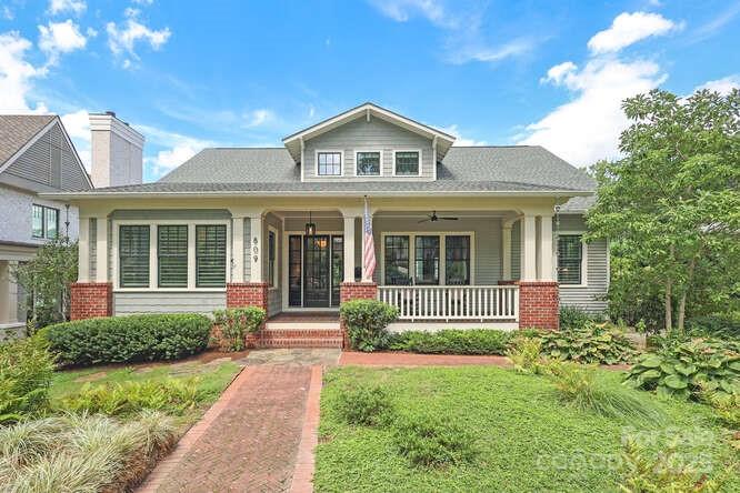 Welcome to 809 Mt Vernon Ave.  This is the home you have been waiting for!
This modern Dilworth bungalow is perfectly located on one of the most beautiful streets in the heart of the Dilworth Historic District.  Built in 2016 and designed by Don Duffy Architecture, this gorgeous home seamlessly blends timeless architectural elements with modern features tailored to today’s discerning homeowner.
The ten-foot ceilings and numerous windows on the first floor highlight the home's spacious layout, enhance its abundant natural light, and accentuate the open and airy design of the home.  Each space is thoughtfully designed with meticulous attention to details throughout. The gorgeous chef’s kitchen overlooks a spacious family room and is anchored by a fireplace and a series of French doors leading to a large, covered porch for dining, entertaining and enjoying the serene back yard with a large saltwater pool. The expansive main floor includes a generous primary suite, two offices, and extra living and dining spaces.
A custom designed steel and wood staircase leads to the second floor, which offers two large bedrooms, a full bathroom, and a versatile skylighted loft space
The lower level provides a second living area featuring a custom-built Murphy bed, a cozy seating area, and a full bath. with a heated floor  French doors open to a secluded rear yard, complete with a resort style saltwater pool and hot tub.
Throughout the home, extensive millwork and custom lighting contribute to its elegance and character. The location is prime.  Within minutes you can be in South End or uptown and The Pearl District for work, dining, shopping and entertainment while also having easy access to schools, parks,  Interstates and the airport . 
809 Mt Vernon Ave offers the perfect blend of classic charm and modern conveniences. This amazing home in this spectacular location truly has it all!