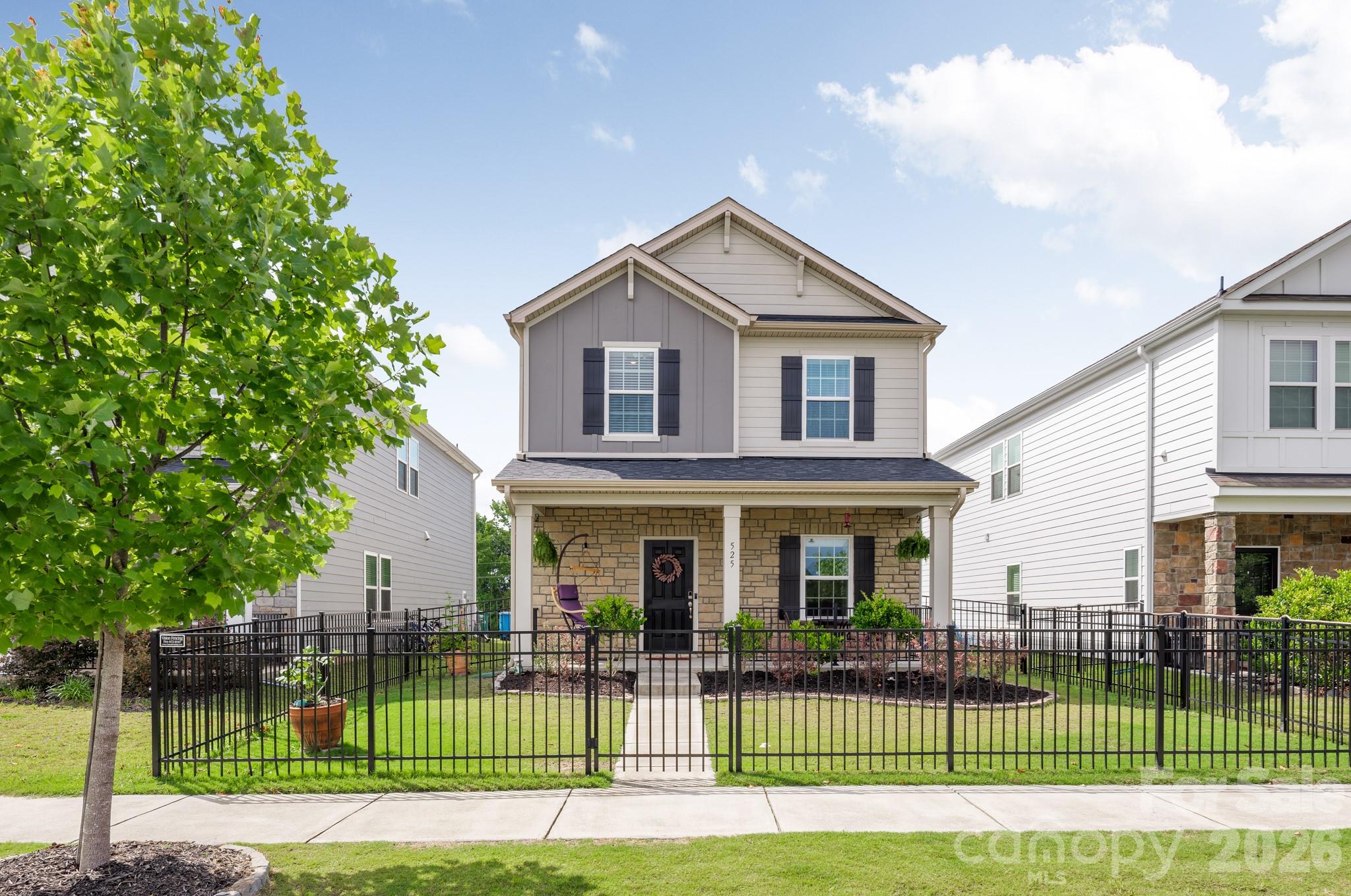 In the heart of Preston Park, this 3 bedroom, 2.5 bath residence offers a refined blend of comfort and walkable convenience in the town of Pineville. The main level unfolds with an open-concept design where the living, dining, and kitchen spaces connect effortlessly, creating a natural flow for both everyday living and entertaining. The gourmet kitchen is enhanced by a generous island, abundant cabinetry, pantry storage, and a walk-in pantry, while new lighting above the bar adds a warm, modern glow that elevates the space.

Upstairs features a huge family room that provides an additional living space creating a flexible second lounge area. The primary bedroom offers a private retreat complete with an ensuite bathroom featuring a double vanity and a walk-in shower. The bedroom level also includes a newly added accent wall in the primary suite, along with thoughtful design touches such as chair railing in the half bath and primary water closet, adding subtle character throughout.

Outdoor living includes a covered front porch and a fenced front yard with newer fencing, adding both privacy and curb appeal, while a rear-entry two-car attached garage with keypad access supports convenience. Community amenities include a swimming pool, playground, sidewalks, and well-lit streets that foster a connected neighborhood setting. One of the home’s most compelling features is its exceptional walkability to downtown Pineville, where the library, coffee shop, and ice cream shop are just minutes away, along with Papas Brewery offering live music and dining around the corner.