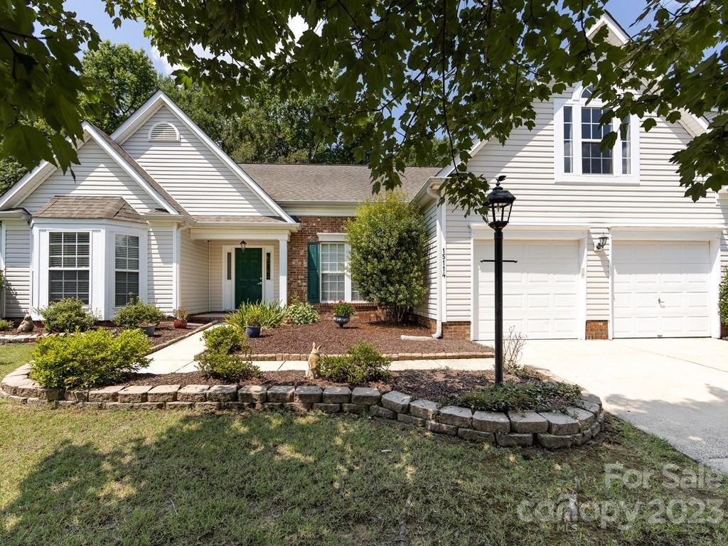 Move-in ready ranch home in Ballantyne! All new wide plank LVP flooring in primary suite, bathrooms and all living areas plus new carpet in the huge bonus room. Entire home has been freshly painted so you can just unpack and relax. White cabinetry and granite in the kitchen with a breakfast bar too. Large primary suite with tray ceiling and dual sink vanity as well as a separate office/study.  Bonus room is roomy and bright with multiple windows. Your living space will be extended with the beautiful stone patio complete with a pergola. Very private, flat backyard. New split system HVAC upstairs & new furnace on main level (2023)! Come discover it today!