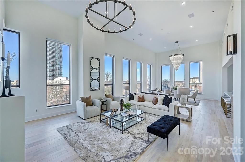 Welcome to “The Penthouse” at The Ivey’s, where modern elegance and masterful design merge to create the perfect setting for luxury living and stylish entertaining! Once inside residence #615, you will be immersed into meticulously designed and thought-out spaces where no detail has been left untouched. The “Gallery” entry hall will boast your favorite art pieces and lead you into the great room featuring soaring 16+ foot ceilings and two walls of 11-foot windows. From the gourmet kitchen featuring a rare Swedish Aga oven, to the Entertaining Room’s English snooker table and wine storage displays… practically every inch of this home has been completely customized! Don’t miss the living room’s linear gas fireplace, the robust home automation system, and the oversized primary bedroom retreat with its spa bathroom. This is a rare opportunity to own this one-of-a-kind residence that was designed for those with the most discerning of tastes!