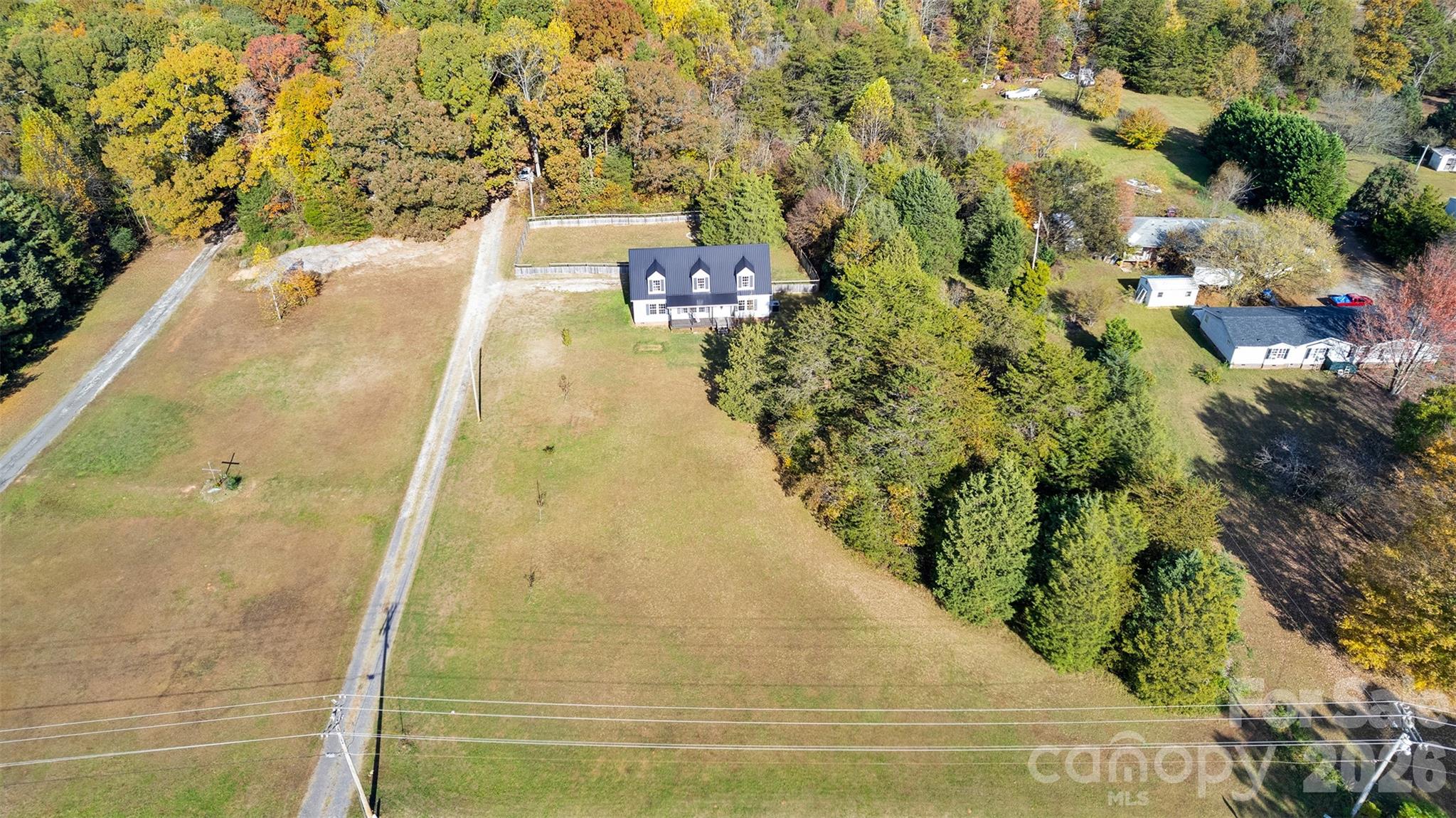 NEW PRICE! Come and see this beautiful 3-bedroom home with 2 huge bonus rooms situated on 10 beautiful acres in the highly sought-after heart of Troutman. Just minutes from I-77, shopping, dining, Lake Norman State Park, and more, this exceptional property offers the perfect combination of privacy, convenience, and endless possibilities.

Whether you’re looking for a primary residence, multi-generational living arrangement, homestead, or future development opportunity, this property delivers. The expansive acreage provides room to grow, build additional homes, or explore the potential for a small residential development.

Inside, you’ll find a thoughtfully designed floor plan featuring three bedrooms plus two oversized bonus rooms upstairs. Each bonus room includes its own closet and shares a full bathroom, making them ideal for guests, extended family, homeschool space, hobby rooms, a home office, or additional sleeping quarters.

Recent updates provide peace of mind and modern comfort, including a fully encapsulated crawlspace, brand-new HVAC system, new carpet throughout, fresh interior paint, updated stair railings, and stylish new lighting and ceiling fans.

The spacious primary suite serves as a private retreat, complete with an oversized soaking tub designed for relaxation after a long day. Move-in ready and full of charm, this exceptional Troutman property invites you to enjoy breathtaking sunrises, stunning sunsets, and the freedom that comes with owning 10 acres of beautiful North Carolina land.