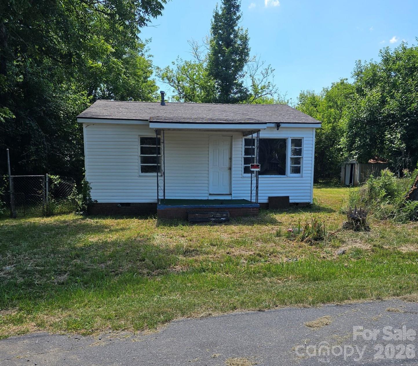 Ideal opportunity for investors, builders, or buyers looking for a project with long-term potential in a growing neighborhood.  This 1940's home needs some renovation but has strong bones. new roof, and plenty of upside including being situated on a quiet street and adjacent to Carol Park.  Conveniently located within steps of McGirt Auditorium, Clinton College, and minutes away from downtown Rock Hill.  It is an excellent opportunity to bring your vision to life.