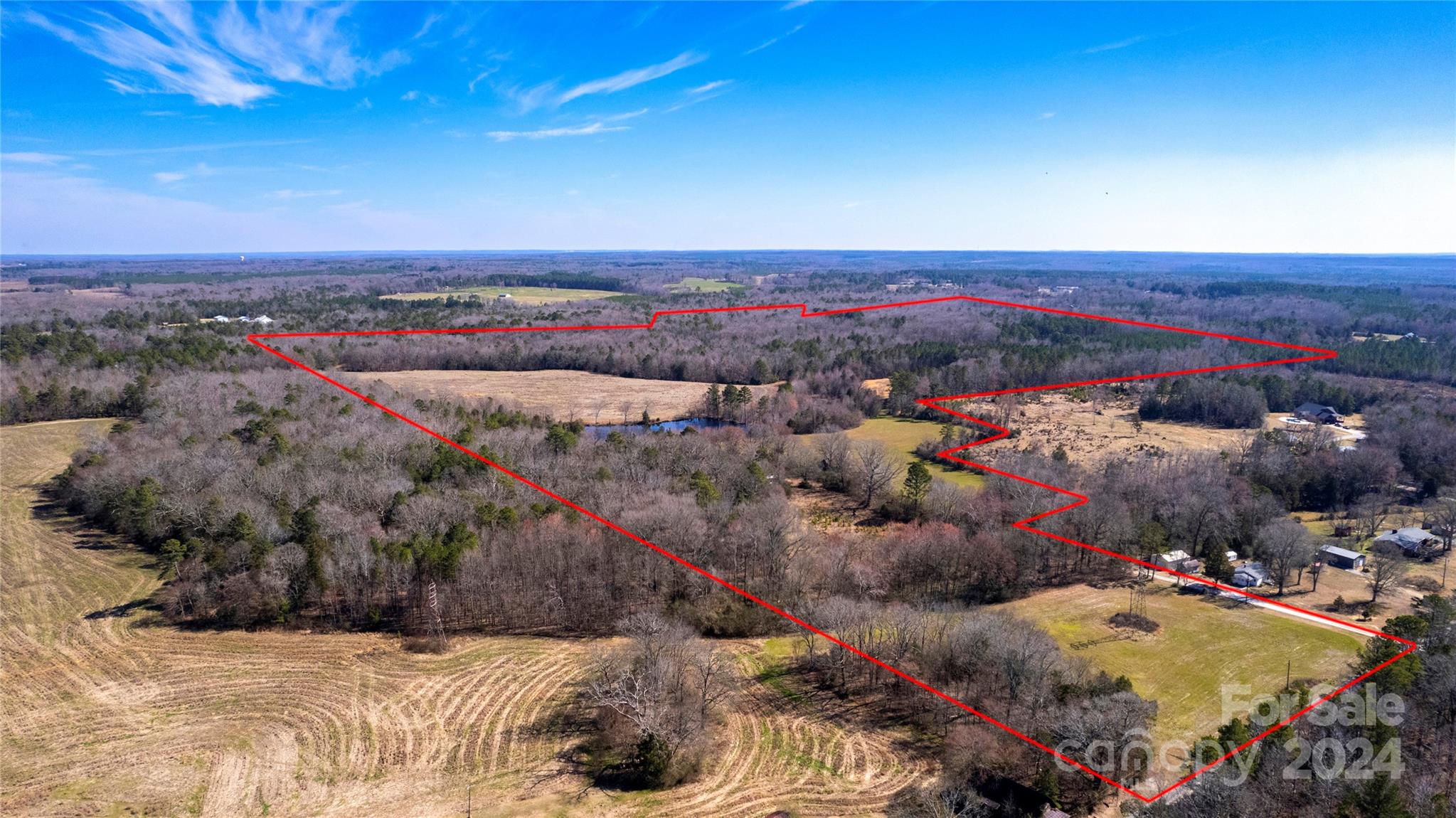 Come check out this fantastic property!! With just over 102 acres there is room to do pretty much what your dreams imagine. From building your dream home over looking the 2 acre pond or utilizing the cleared 25 acre for your immediate farming needs. The remainder of land could be used as hunting property, recreational riding, etc. the sky is the limit. This could be your piece of "heaven". Don't let this once in a lifetime opportunity pass you by.