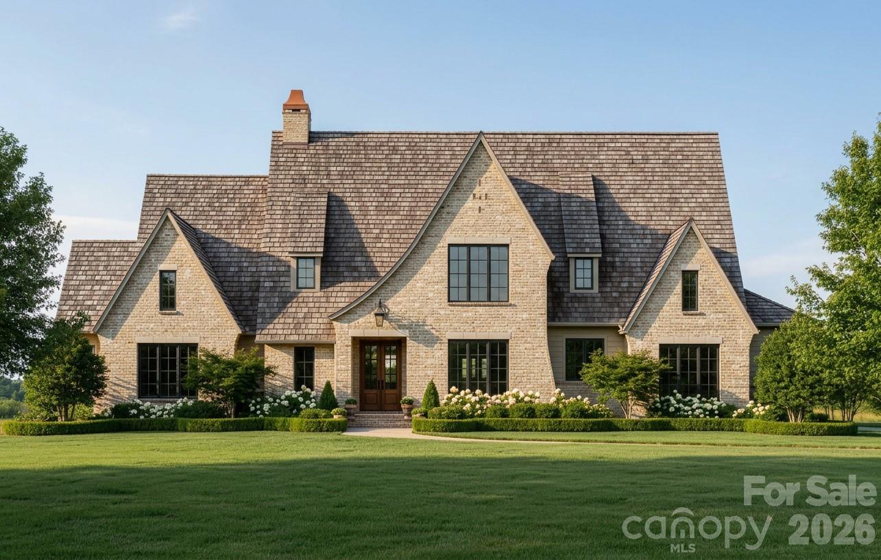 This home blends traditional European architecture with contemporary finishes and clean lines - it is timeless, sophisticated and warm.  A welcoming foyer leads into an expansive great room that flows seamlessly into the gourmet kitchen, featuring a large island and walk-in pantry—ideal for both entertaining and everyday living. The formal dining room and nearby wet bar create an inviting space for hosting guests.

The private primary suite serves as a relaxing retreat with a spa-like bath and enormous walk-in closet.  Two additional bedrooms are located in a separate wing for privacy. A dedicated home office, convenient laundry room, and drop zone near the three-car garage add everyday functionality.  Upstairs features a loft and 2 additional bedrooms with private baths and endless storage!

Outdoor living shines with a large screened porch complete with an outdoor grill area and fireplace, perfect for relaxing or entertaining. Designed with both luxury and livability in mind, this home offers sophisticated spaces inside and out.

Sage at Marvin is an exclusive gated enclave of just 23 estate homes, situated on .7 acre to 5 acre wooded homesites, with homes starting at $2M. Peters Custom Homes is known for exceptional craftsmanship and curated finishes. Enjoy a true concierge building experience with dedicated in-house design services guiding you through every step of creating your dream home. Top rated Marvin schools!