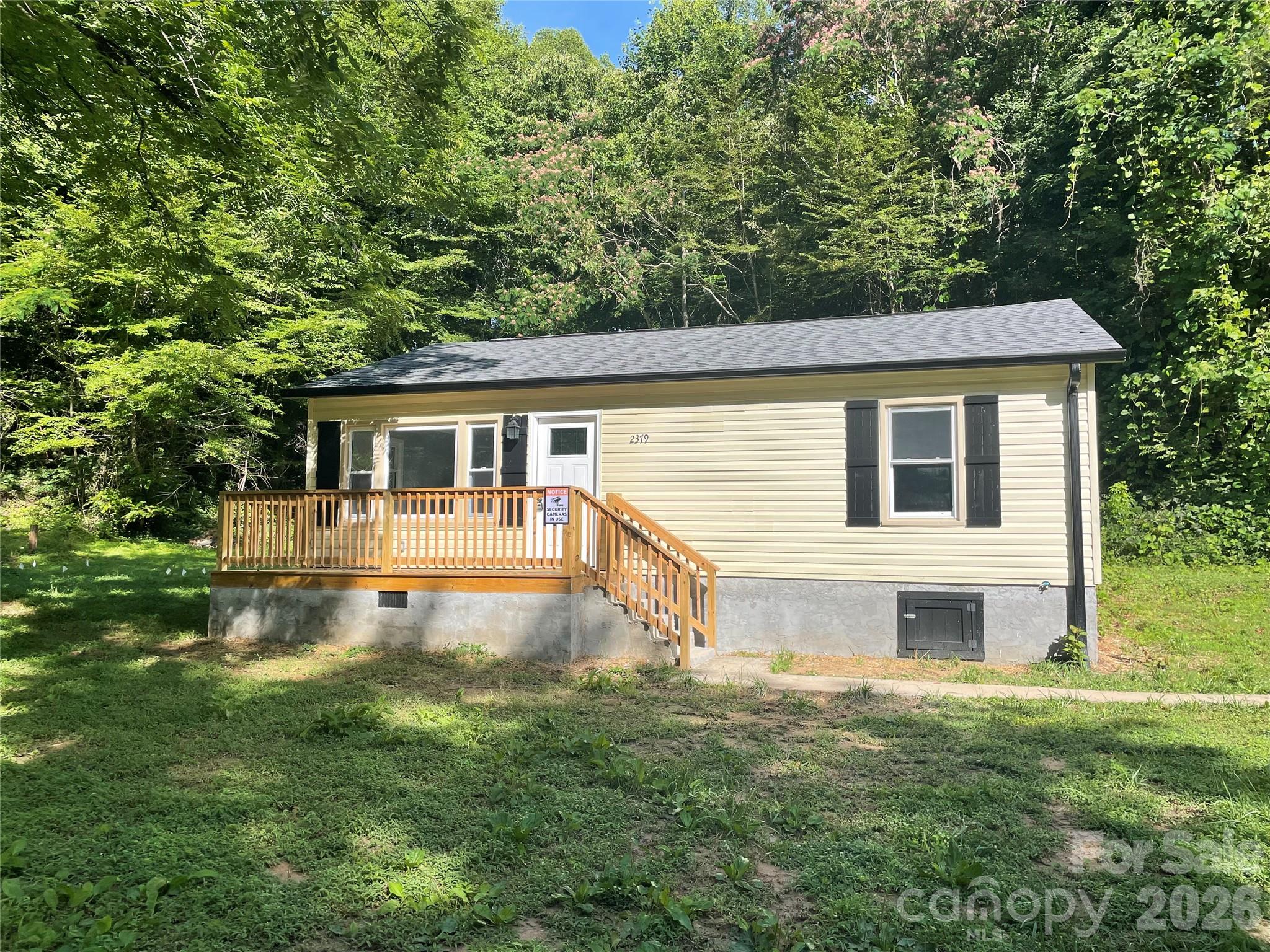 Recently remodeled 3 bedroom home in quiet country setting.  THis home has had many upgrades added including new flooring, countertops, electric system, new roof, new HVAC unit, and this is just a portion of the upgrades.  Come take a look at this turn key home before someone beats you to it.