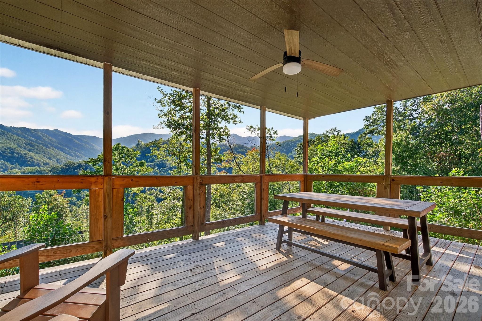 Spectacular year-round mountain views just below the Blue Ridge Parkway, surrounded by protected National Forest. This exceptional property offers a true family escape or a high-performing short-term rental opportunity. The main home features 6 bedrooms and 6 bathrooms, thoughtfully designed for comfort, privacy, and effortless entertaining. Bertazzoni appliances on the main and an extra refrigerator on the lower level. Two additional themed guest cottages, each with their own private bathroom, expand hosting potential and create a unique retreat experience. Enjoy the long-range vistas from the covered deck, unwind in the hot tub, or utilize the lower-level  flex space—ideal for a workout room, recreation area, or media room. Scenic drive up Buck Creek with easy access to Marion, Black Mountain or Asheville. Only 10 min from Mt.
Mitchell Golf Club. Short-term rental financials are available upon request. For buyers seeking an even larger retreat, the home located just below this property is also available for purchase, allowing the opportunity to create a truly rare mountain compound sleeping 14+ guests with 14 private bathrooms. Cross posted- combined MLS 4342793
See MLS 8026 Buck Creek for other home.