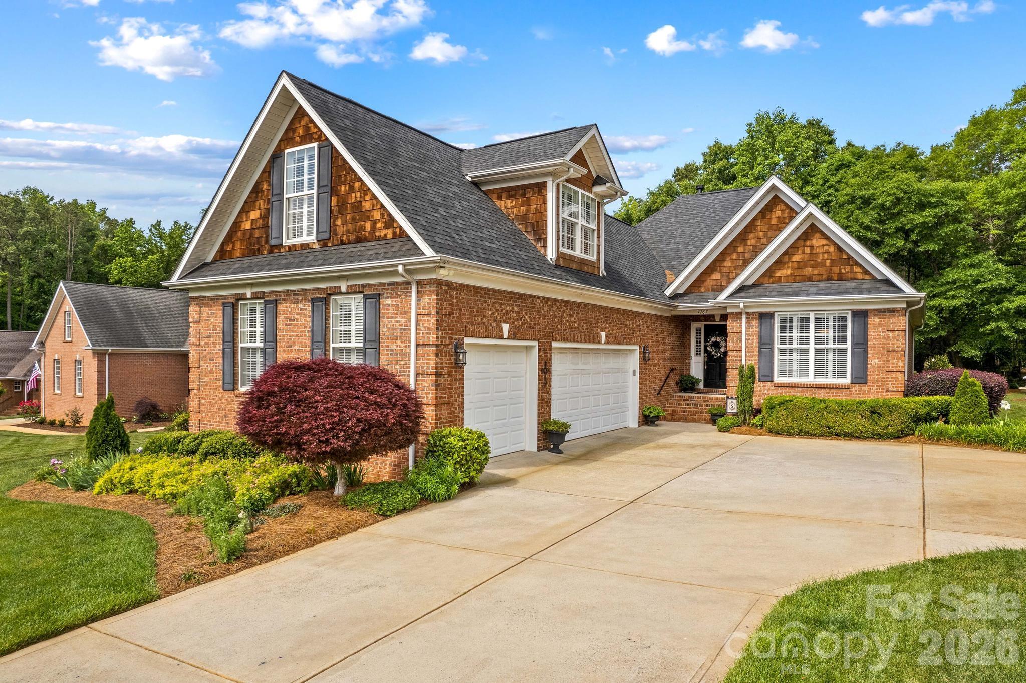 Welcome to 7767 St. Andrews Lane, nestled on a quiet cul-de-sac in the highly desirable Cowan’s Ford Country Club community at Lake Norman. This stunning full-brick home offers timeless curb appeal, a spacious and thoughtfully designed layout, and the perfect blend of comfort and functionality for everyday living and entertaining alike. A standout feature is the expansive 3-car garage, providing ample space for vehicles, storage, hobbies, or a workshop setup. Recent major updates include a new roof and HVAC system installed in 2024, offering added peace of mind for years to come. Step outside and enjoy the expansive rear deck overlooking the beautifully manicured lawn and private wooded backdrop — an ideal setting for relaxing mornings, outdoor gatherings, or simply unwinding in your own peaceful retreat. Situated in an established neighborhood known for its mature trees, quiet streets, and close proximity to Lake Norman, this home offers both privacy and convenience. The Cowan’s Ford Golf Club, located within the community, offers optional memberships featuring a championship golf course, tennis, pickleball, an olympic-size pool, and a vibrant social atmosphere. Whether you're searching for a tranquil retreat or an active lifestyle, this exceptional property delivers the best of both worlds with comfort, location, and the opportunity to enjoy Lake Norman living at its finest. Don’t miss your chance to own in one of the area’s most sought-after communities.