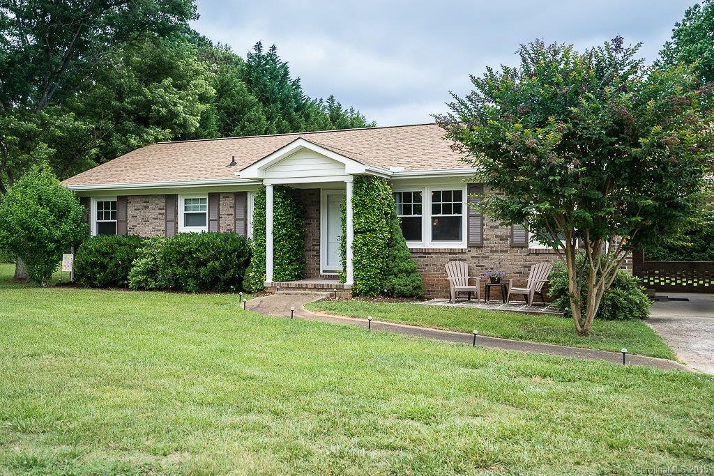 This is such a rare find.  Full brick home on a large flat lot with fenced back and fully wired & insulated workshop/bldg.  It is cute as a button and move in ready.  Freshly updated with new paint, new carpet, newer roof, water heater, upgraded HVAC and a very large and comfortable family room with french doors leading to the deck.  This is a quiet neighborhood and only 3 minutes to York Comprehensive High School. 13 month warranty in place.  It is beautiful - come take a look!