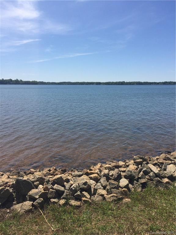 160' of Waterfront on this Lakeside @ Langtree lot. Community of 7 Waterfront Homesites on south facing point w/ incredible lakefront views, off Lake Norman main channel. Award winning custom homes, crafted by Patrick Joseph Distinctive Homes, clearly define this All Waterfront Enclave of homes as the Premier lakefront location on all of Lake Norman. Each Estate will be designed to maximize WF views & the lakefront lifestyle as well as complementing/embracing the overall Langtree Community.