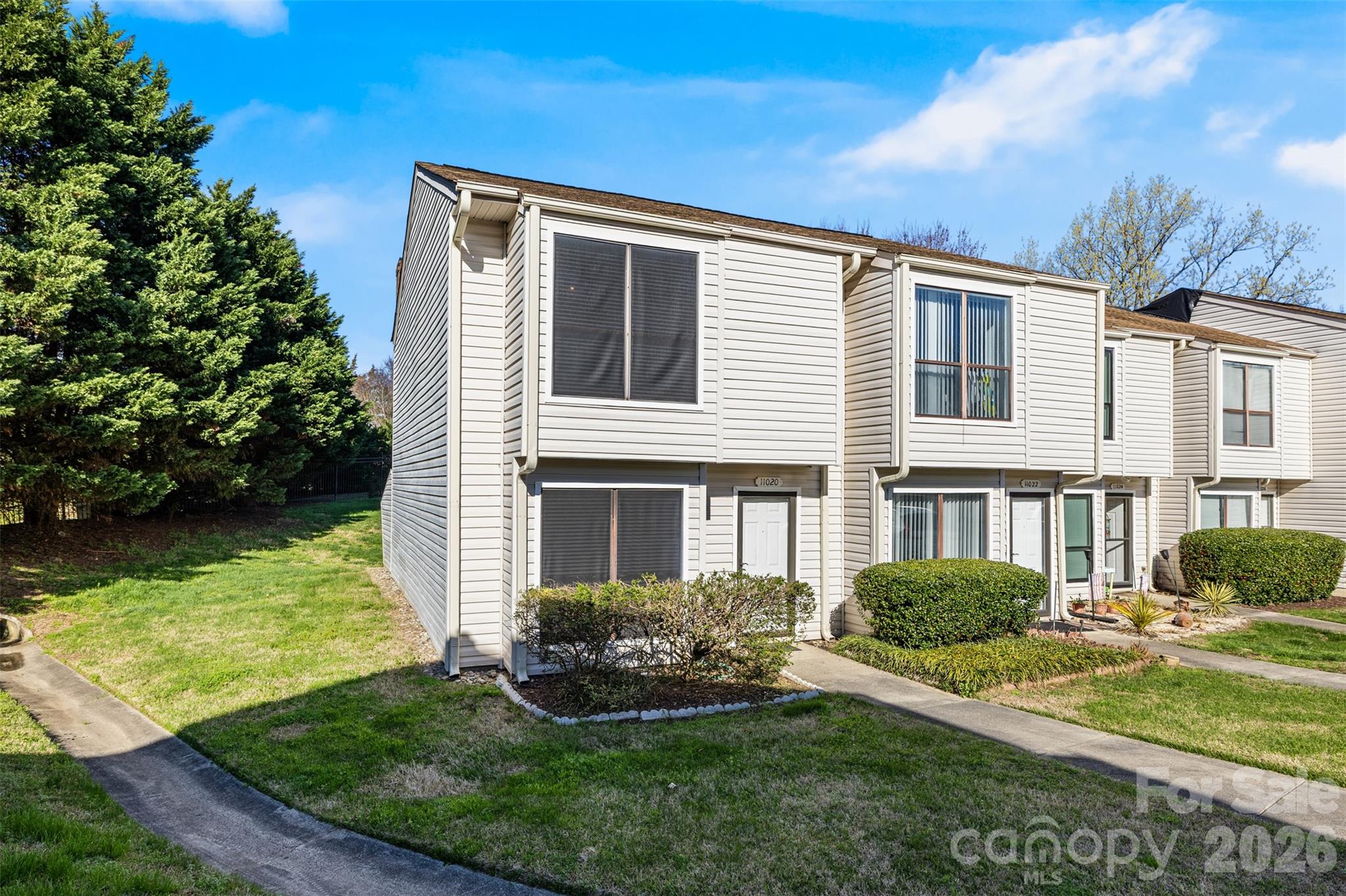 Rare end-unit townhome in desirable South Charlotte! Enjoy added privacy with a tree-lined backyard and serene setting. Located in a quiet neighborhood with convenient access to shopping, dining, and major roadways. Zoned for top-rated schools: Endhaven Elementary, South Charlotte Middle*, and Ballantyne Ridge High. The kitchen features neutral cabinetry, granite countertops, and a breakfast bar overlooking the family room with a cozy fireplace. Luxury vinyl plank flooring, fresh interior paint, and two-inch blinds add to the home’s updated appeal. Enjoy relaxing or entertaining on the private back patio. A must-see!
