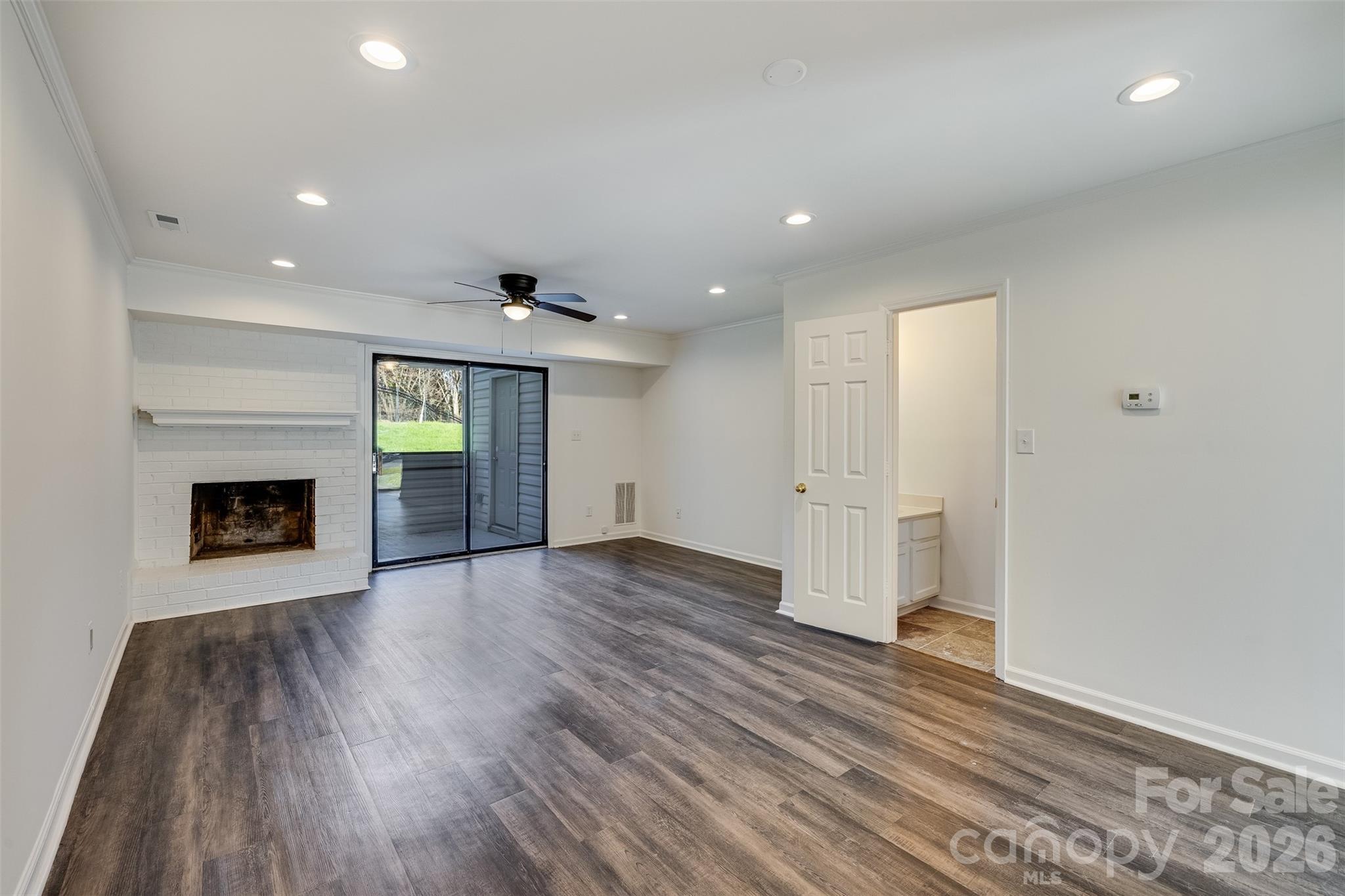 Rare end-unit townhome in desirable South Charlotte! Enjoy added privacy with a tree-lined backyard and serene setting. Located in a quiet neighborhood with convenient access to shopping, dining, and major roadways. Zoned for top-rated schools: Endhaven Elementary, South Charlotte Middle*, and Ballantyne Ridge High. The kitchen features neutral cabinetry, granite countertops, and a breakfast bar overlooking the family room with a cozy fireplace. Luxury vinyl plank flooring, fresh interior paint, and two-inch blinds add to the home’s updated appeal. Enjoy relaxing or entertaining on the private back patio. A must-see!