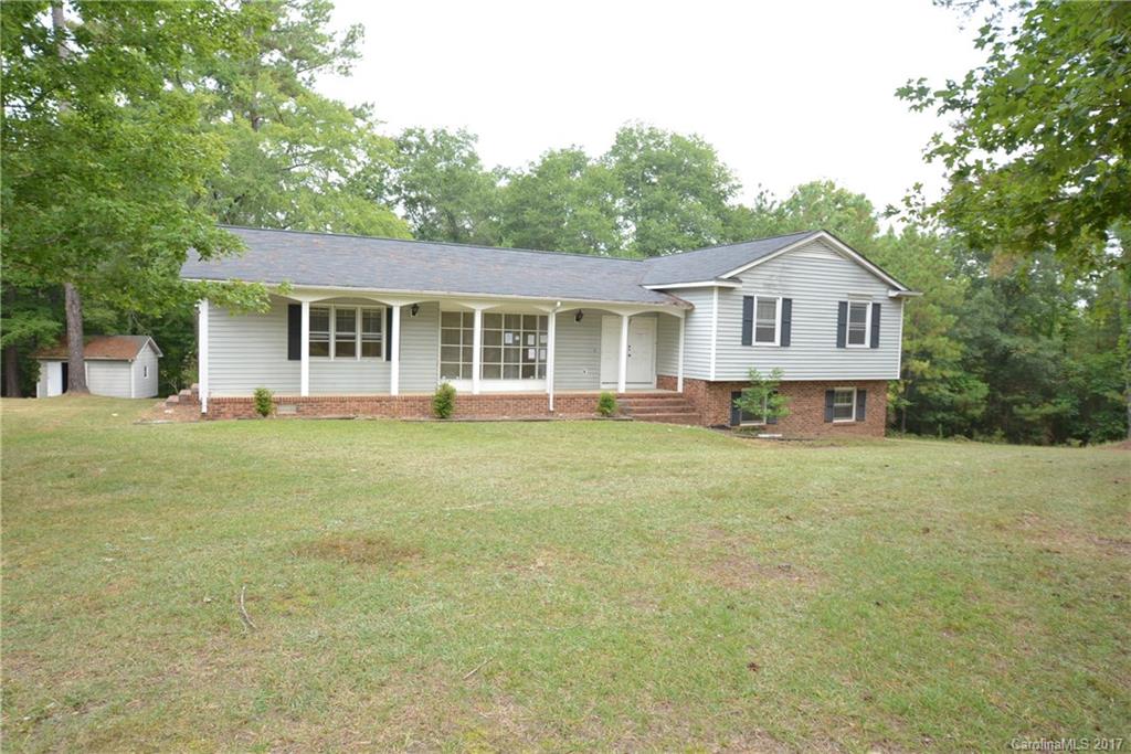 So much potential with over 3000 square feet on over 4 acres in the county!  No city taxes!  Formal rooms, recreational room downstairs, 4 bedrooms with 3 1/2 baths.  Roof is approximately 5 years old.  With some work, this house can become an amazing home.