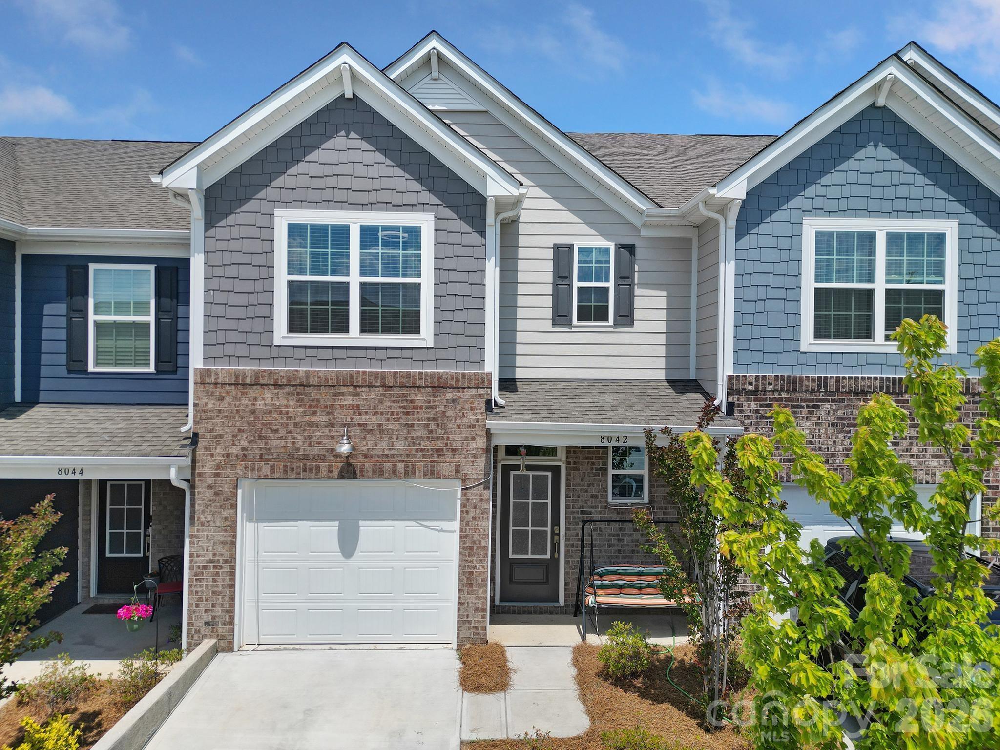 Welcome to this meticulously maintained 3-bedroom, 2.5 bathroom townhome, ideally located in a top-rated schools district. This newer construction home offers the perfect blend of contemporary design and low-maintenance living. The spacious living area flows seamlessly into the modern kitchen, which boasts sleek cabinetry, stainless steel appliances, quartz countertops, and a large island perfect for casual dining or entertaining. Upstairs, the primary suite includes a large closet and an en-suite bath with dual vanities and a walk-in shower. Enjoy the ease of townhome living with a private screened porch, attached single car garage, and access to nearby parks, playgrounds, and so much more. Located just minutes from shopping, dining, and major commuter routes, this home truly offers the best of modern living in an unbeatable location. Don’t miss out on this exceptional opportunity—schedule your private tour today!
