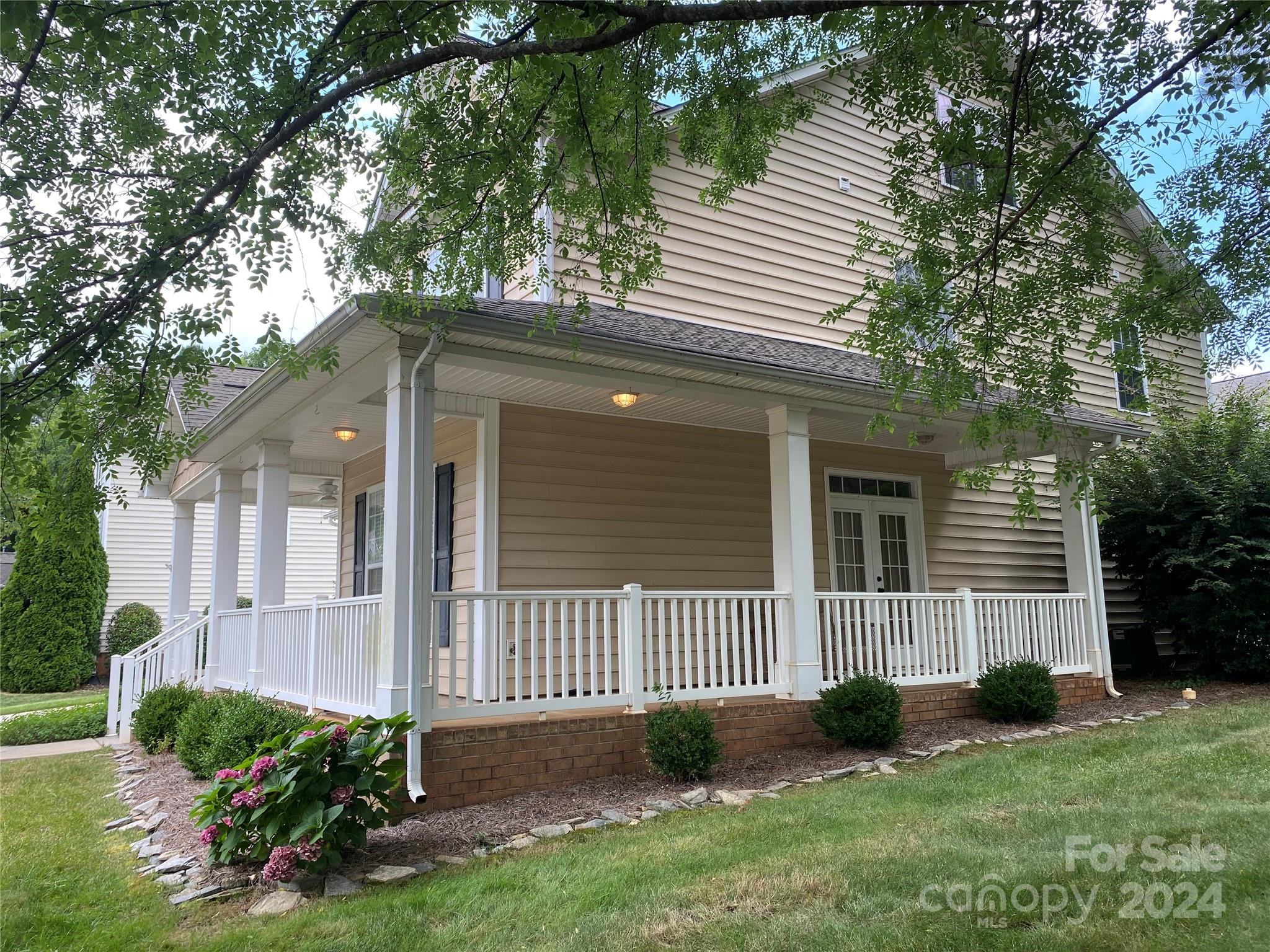 Square footage galore!  This beautiful home has so much room - with bonus space that could be game rooms, craft rooms, school rooms, or 4th and 5th bedrooms!  On the main floor, the space is perfect for entertaining, with double doors off the dining/sitting room area that open out to the rocking chair porch. The kitchen boasts granite countertops, stainless steel appliances, and a cozy breakfast nook. The open living area flows out the back doors to the extended patio and fenced yard. Upstairs, the master suite features a tray ceiling, an en-suite bath with a double vanity, a soaking tub, and a walk-in shower.   The secondary bedrooms feature a 'jack-n-jill' bath, with an additional bed/bonus room on the 2nd floor and a great entertainment/bonus room on the 3rd floor.  Relax and enjoy your shaded, wrap-around porch, the neighborhood splash pool and playground, or explore Rock Hill's vibrant downtown, various parks, riverfront areas, and numerous community and sports events.  Welcome In