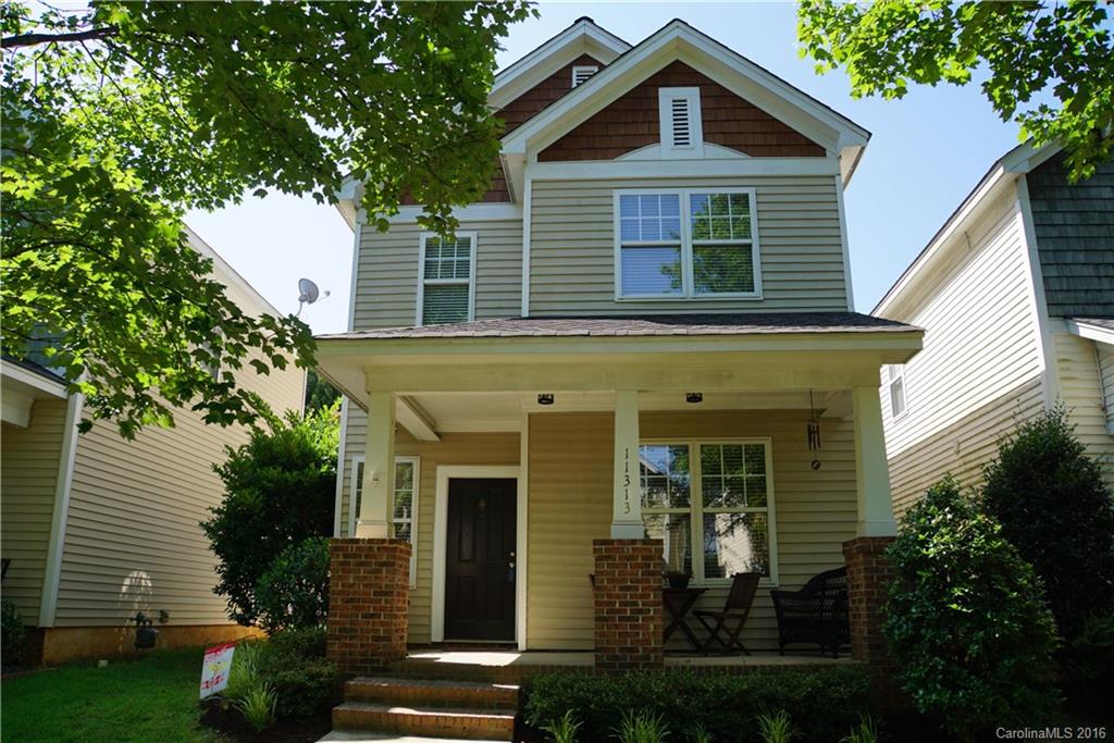 Charming Ballantyne area bungalow w/ recent updates. New carpet, new laminate hardwoods, AC & hot water heater. Kitchen includes stainless steel appliances & 42" maple cabinets. Fence & roof were replaced 5 years ago. Great room is open to the kitchen & includes surround sound & gas fireplace. 2" wood blinds throughout. Lovely courtyard with large shady tree, white picket fence, & brick patio. Detached 2 car garage. Convenient to Ballantyne amenities & 485.