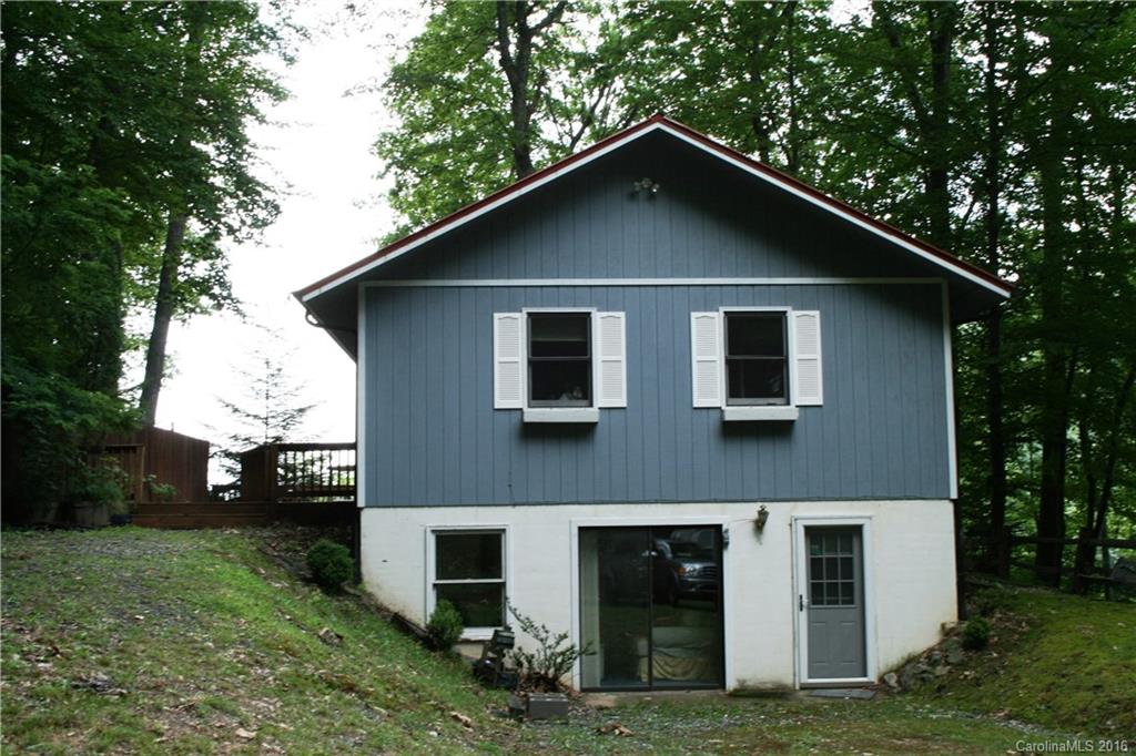Large lot with a cozy cabin overlooking a multi-mountain view!!  Great get-away cabin, very private setting.  
Wood floors in living area, Storage shed on property.  Oversized deck for entertaining.  Great house, great value/  Mostly furnished