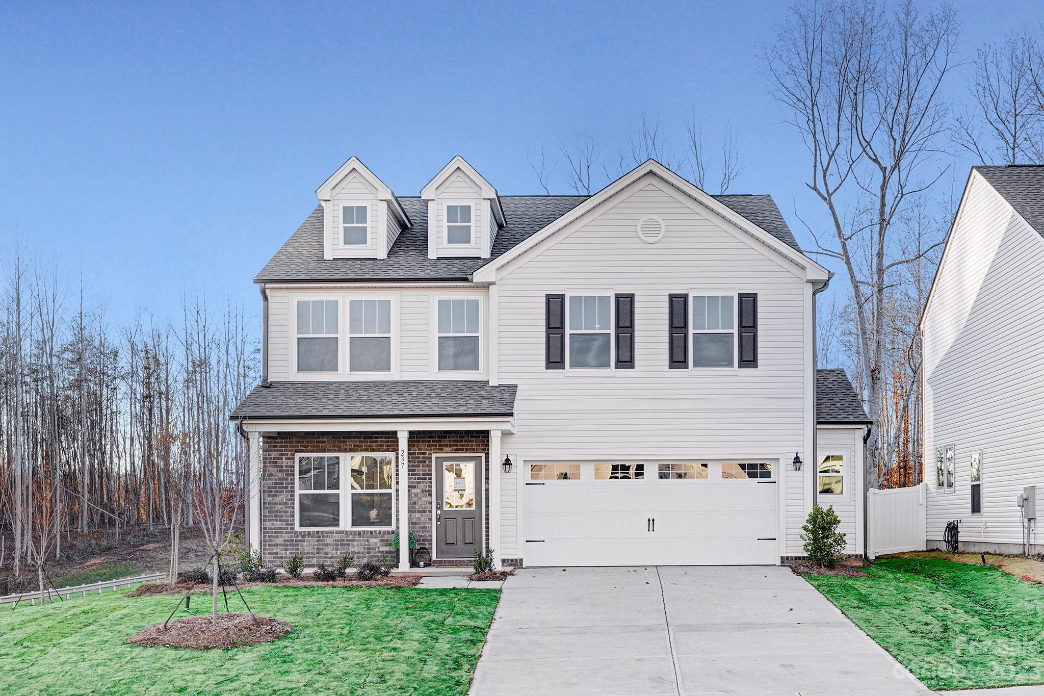 Quick Move-In! 3BR/2.5BTH Lenox in Troutman, Minutes to I-77, I-40 and convenient to Lake Norman State Park, Downtown Statesville, Troutman, and Mooresville entertainment, dining, and shopping. Floorplan features a large kitchen and spacious great room. Kitchen features include upgraded tile backsplash, quartz countertops, painted cabinetry and more! The second floor features an spacious Owner's Suite with Large Walk-In Closet and a Large Owners En-Suite Bathroom with garden tub, dual vanities, and tiled walk-in shower.  Rounding out the second floor are two secondary bedrooms, additional full bath, laundry room, and utility room.  Spacious 2 car garage also features 4x16 bump for extra space!