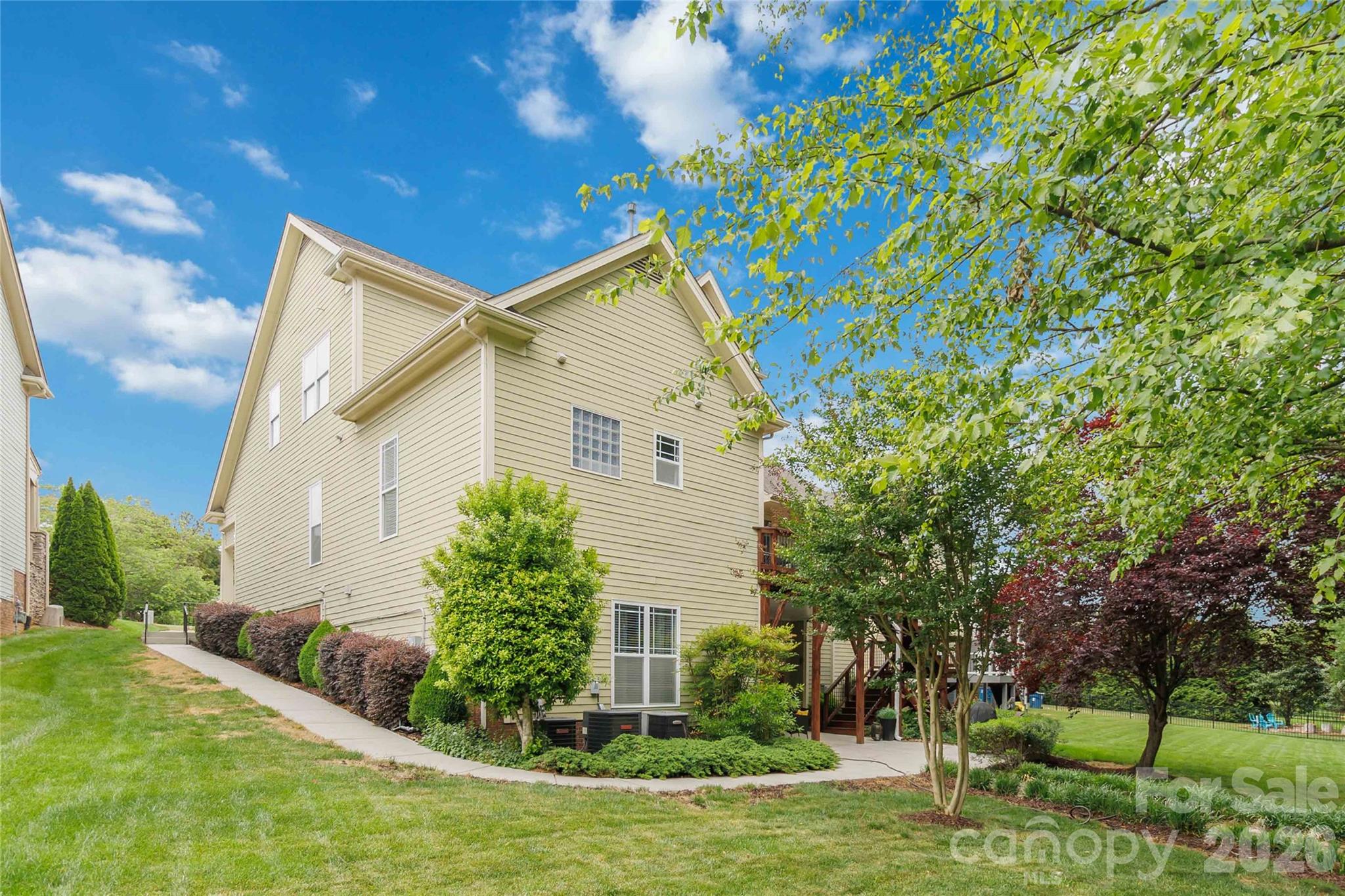 ## REVISED MLS PUBLIC REMARKS — $734,900

Where else can you get 4,155 finished square feet for under $735,000 in Skybrook?

At $177 per square foot, this home delivers more space, more flexibility, and more value than almost anything else in this price range — including a main-level primary suite, a two-story great room with a stone gas fireplace, a dedicated home office, formal dining room, and a fully finished walk-out basement with its own kitchen, bedroom, full bath, living area, and private entrance.

The main level offers an updated kitchen with quartz counters and stainless appliances, a bright breakfast area, main-level laundry with a sink, and a half bath for guests. Upstairs, four additional bedrooms and a full bathroom provide room to spread out — home office, playroom, gym, guest space, whatever you need.

The basement level functions as a complete second living space, ideal for guests, extended family, or simply extra square footage you can use however fits your life — without the price tag of a larger custom build.

Outside, the .31-acre lot backs to a creek with mature trees, offering genuine privacy. Enjoy a covered front porch, main-level deck, basement-level walk-out patio, and a private stone fireplace tucked into the trees.

Major systems are done: new roof (2022), two HVAC systems (2021 & 2022), and a full deck replacement (2023) — meaning your budget goes toward making this home yours, not catching up on deferred maintenance.

Located in Skybrook with walking trails, a playground, and optional golf, tennis, swim, and fitness memberships. Top-rated Cox Mill schools. Minutes to I-77, shopping, and dining.

More space, more value, more options — at a price that makes sense.

*(1,512 characters — within MLS limits)*