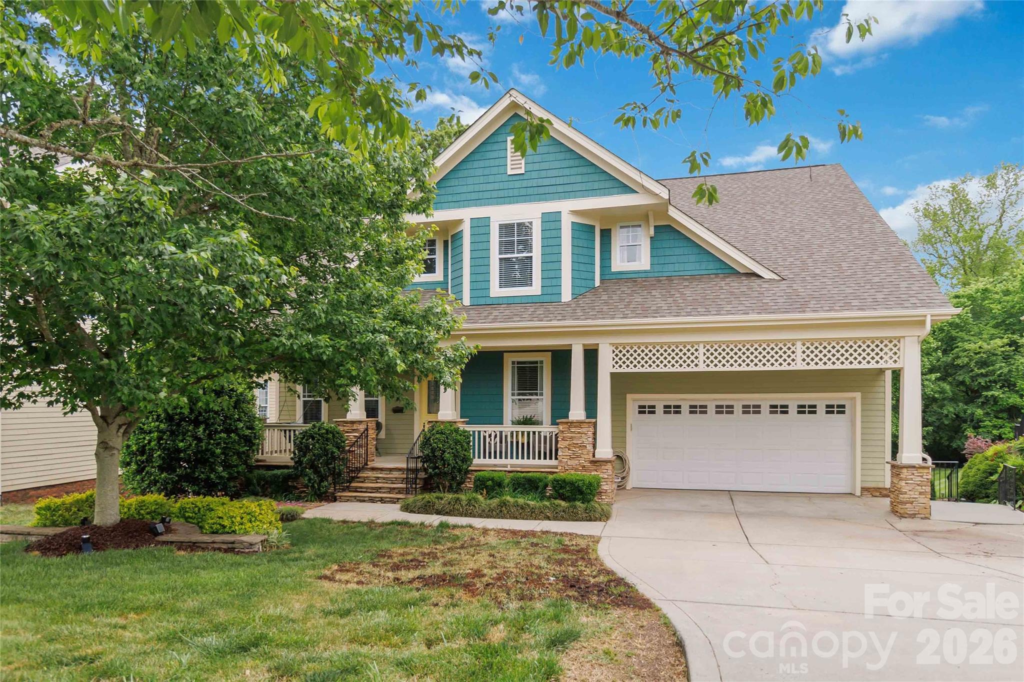 Where else can you get 4,155 finished square feet for under $735,000 in Skybrook?

At $177 per square foot, this home delivers more space, more flexibility, and more value than almost anything else in this price range — including a main-level primary suite, a two-story great room with a stone gas fireplace, a dedicated home office, a formal dining room, and a fully finished walk-out basement with its own kitchen, bedroom, full bath, living area, and private entrance.

The main level offers an updated kitchen with quartz counters and stainless appliances, a bright breakfast area, main-level laundry with a sink, and a half bath for guests. Upstairs, four additional bedrooms and a full bathroom provide room to spread out — whether for a home office, playroom, gym, or guest space.

The basement functions as a complete second living space, ideal for guests, extended family, or simply extra square footage you can use however fits your life — without the price tag of a larger custom build.

Outside, the .31-acre lot backs to a creek with mature trees, offering genuine privacy. Enjoy a covered front porch, a main-level deck, a basement-level walk-out patio, and a private stone fireplace tucked into the trees.

Major systems are done: new roof (2022), two HVAC systems (2021 & 2022), and a full deck replacement (2023) — meaning your budget goes toward making this home yours, not catching up on deferred maintenance.

Located in Skybrook with walking trails, a playground, and optional golf, tennis, swim, and fitness memberships. Top-rated Cox Mill schools. Minutes to I-77, shopping, and dining.

More space, more value, more options — at a price that makes sense.