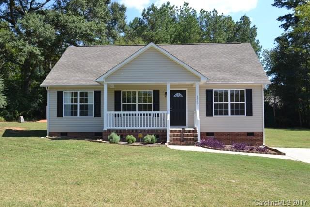 What a dollhouse!  This home sits on an acre lot, has a split bedroom plan and some updates.  Rinnai tankless water heater, newer heat pump, new stainless appliances.  There is gas hookup for a gas range.  Vaulted great room with fireplace/new gas logs,  spacious kitchen with breakfast bar.  Wired 12x16 building.  Hurry - this won't last long!