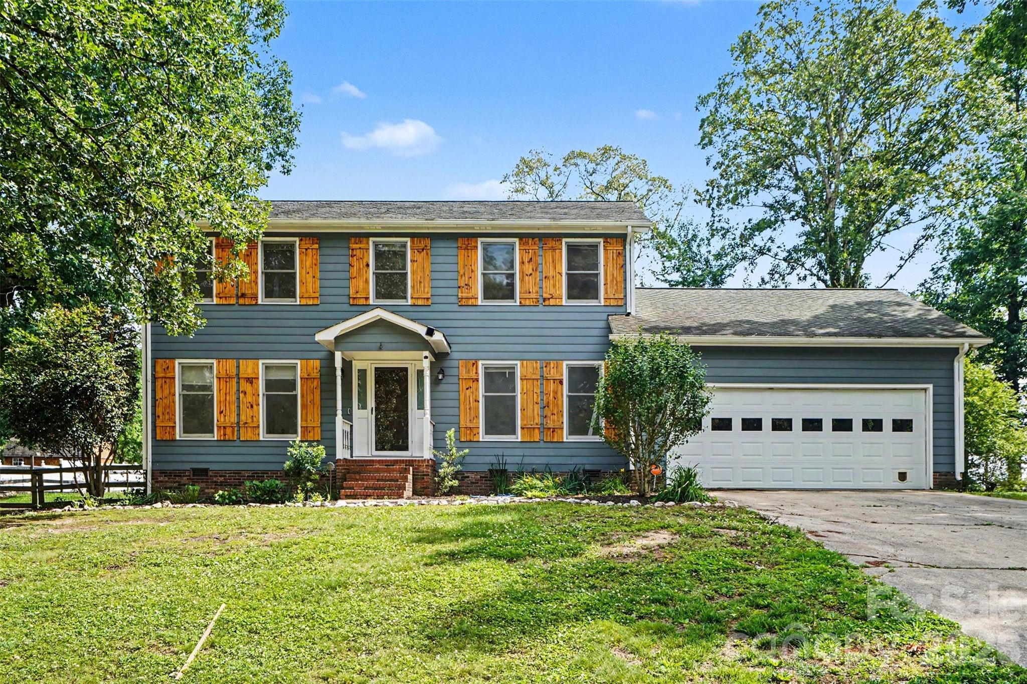 Gorgeous renovated home just minutes from Moss Lake and its public boat landing. This beautiful 3-bedroom, 2.5-bath home is loaded with updates and ready for its next owner.
The main level features stunning fossilized bamboo flooring throughout the living areas and an updated kitchen complete with butcher block countertops, black stainless appliances, breakfast bar seating, and an eat-in dining area. Also on the main level are a formal dining room, laundry room, and a spacious living room with a gas fireplace. Barn doors lead to a versatile sunroom/office space.
Step outside into an entertainer’s dream backyard featuring a fenced yard, a new Trex covered deck with a pergola, fire pit area, garden space, and an outbuilding.
Combining beautiful updates, functional space, and a location near lake recreation, this home truly has it all.