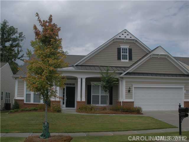 This Morningside Lane floor plan located on a waterview /wooded lot?. Beautifully and professionally  landscaped,screened porch, custom patio, granite, stainless steel app, 5-burner gas stove & tile back splash in ktn, security sys, large sun room w/dual fans. Expanded driveway and yard irrigation-- Disclosures included in Attachments.Buyer pays 1/3 of 1% for HOA capital assessment.