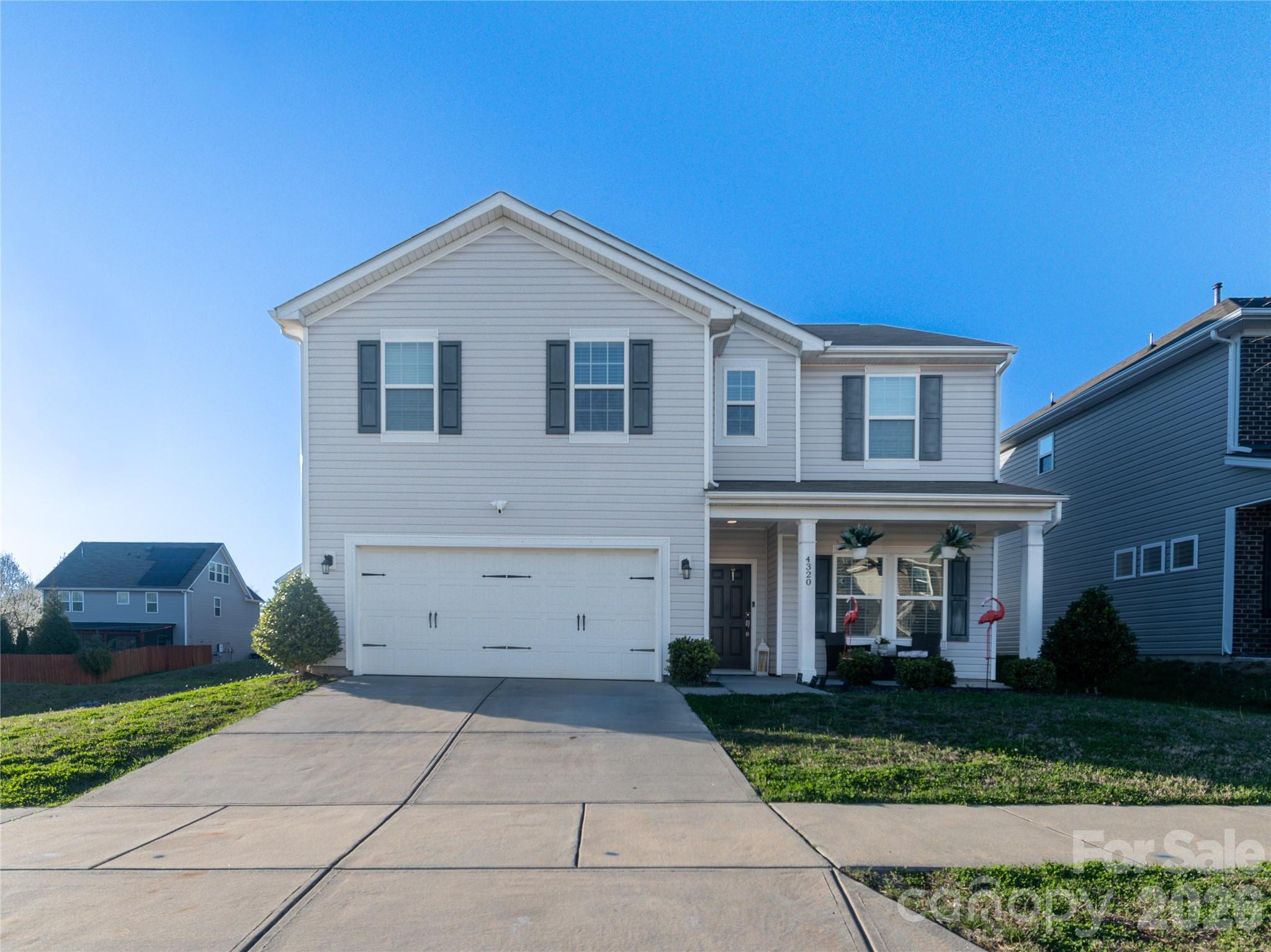 Move-in ready home with a spacious open floor plan designed for comfortable living and entertaining. The large kitchen features a gas stove and center island and flows into the great room, which features a cozy corner gas fireplace. A dining area with a breakfast nook and a main-level office offer flexible spaces for work or guests. Step outside to a covered porch and extended patio overlooking a fenced backyard with white vinyl privacy fencing. Upstairs includes four bedrooms, a large loft, and a convenient laundry room. The primary suite features a tray ceiling, a walk-in closet, and a bathroom with a soaking tub and separate shower.