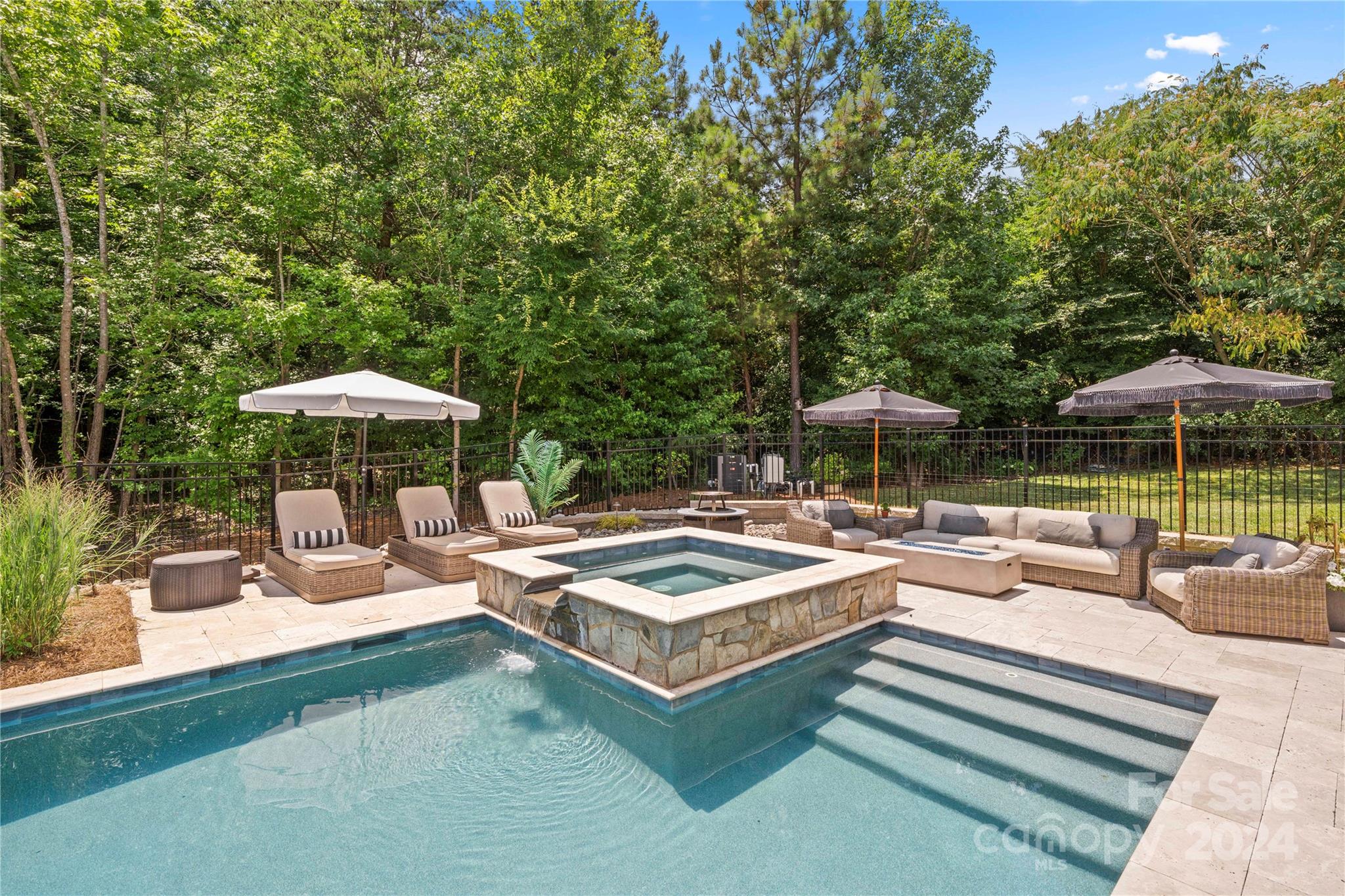 Oasis living at its Best. This Stunning Pool home in the desirable Retreat at Sunset Ridge feels like a real resort of your very own. No expenses spared here. This home features 5 spacious bedrooms, 4 full bathrooms and a dedicated office to satisfy all your space needs. 3 Car garage and a large lot give you all the room to spread out. 
Pool and full landscaping done in 2020, as well as a driveway extension and upgrades galore. The home is well layed out and tastefully decorated. We love the pergola  porch on the back and the ample ceiling fans added to keep you cool. 
Primary bedroom features and oversize walk in closet with ample storage. Laundry room located upstairs. Spacious bonus room can be used for whatever you need! Located in the highly desirable Clover School District this home is just waiting for you!