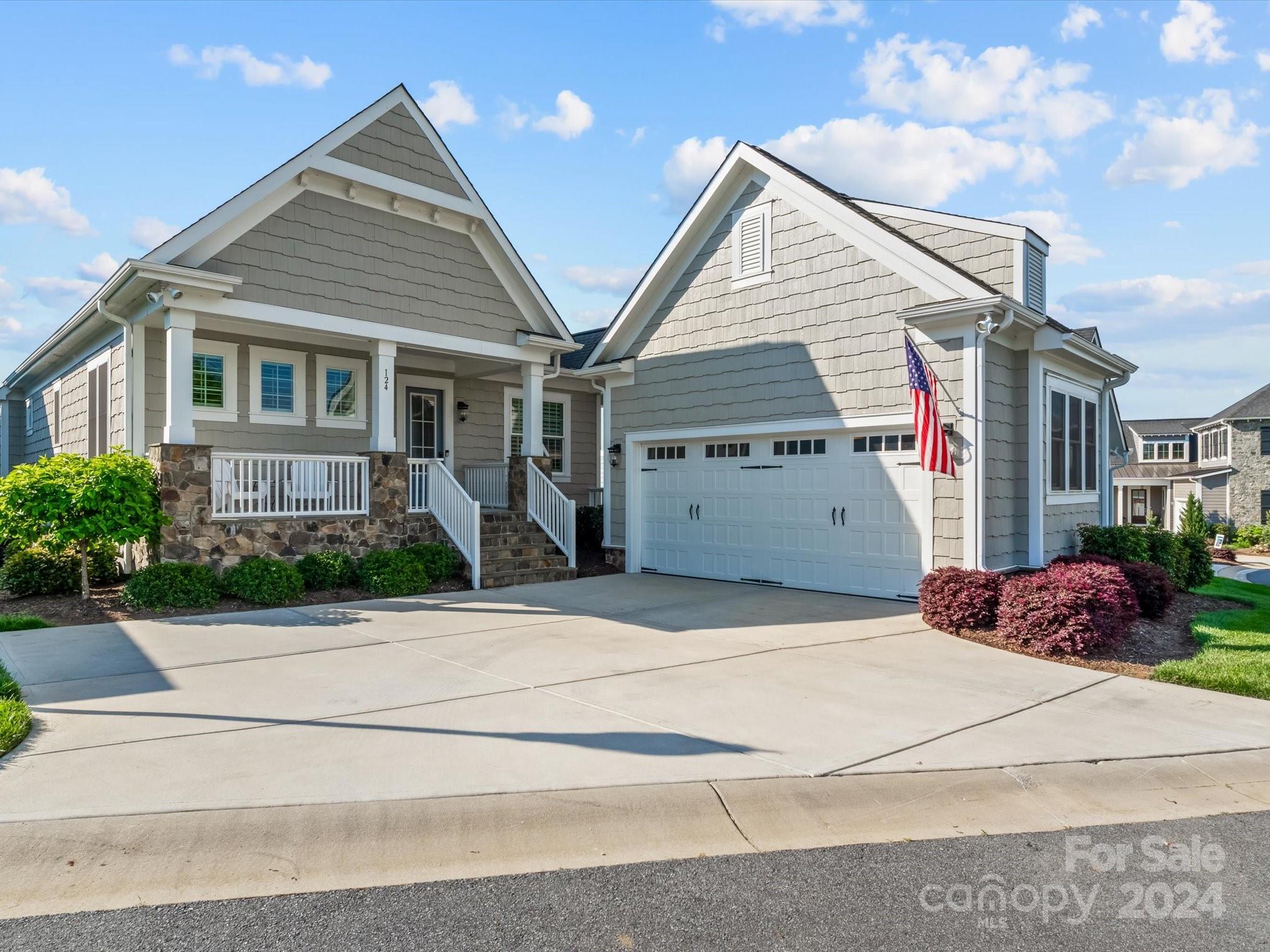 Looking for Spectacular Views, Low Maintenance Living & close proximity to all your dining & shopping needs? You will absolutely fall in love with this beautiful Lake Norman WATERFRONT ranch home with lower level walk-out basement & deeded BOATSLIP. Main level features a huge chef's kitchen that boasts an expansive island & eating bar, dual ovens, gas cooktop, roll-out cabinets, wet bar & walk-in pantry. The open concept is perfect for entertaining with kitchen overlooking large great room, dining overlooking lake & the amazing Champion sunroom featuring a wall of screened glass windows & HVAC mini-split for use in all seasons! Main level also features a spacious primary w/custom closet, office, laundry & drop zone off garage entrance. Lower level offers two large bedrooms & bath, large workshop area w/endless possibilities & a rec room that opens to a covered patio & beautiful lake views! Neighborhood features maintenance free living, fire pit, dog park & walking trails. A Must see!