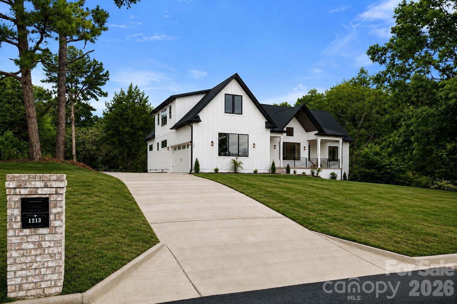 Exceptional, new custom-built modern farmhouse in the highly sought-after Lakeview Estates!
Featuring impeccable craftsmanship and stunning curb appeal, this home offers the freedom of NO HOA with lake views! 
The open-concept main floor features a vaulted dining area, living room, and a chef’s kitchen boasting an oversized island, walk-in pantry, and high-end, top-of-the-line appliances. Designed for luxury and convenience, the main floor hosts two master suites, including a private owner's retreat featuring a vaulted great room, a luxurious spa-inspired bath, and a custom-organized walk-in closet, and a generous secondary master suite, with a gorgeous bathroom and custom walk-in closet. A dedicated office, mudroom, coffee bar, and laundry room complete the main level, including all real hardwood floors. Upstairs, you’ll find two spacious bedrooms, a full bath, a second laundry station, and a versatile loft area. Outside, enjoy the serene front porch with lake views, or entertain on the expansive rear porch overlooking the fenced backyard, with ample space for adding your dream pool in the future. Complete with a 2-car garage and multiple parking spaces including a paved RV parking. Beyond Atrium hospital, schools and shopping corridors, the area offers a diverse mix of family-friendly attractions, parks, historic downtown spots, and highly-rated local dining. This house is move-in-ready, so schedule a tour today!
