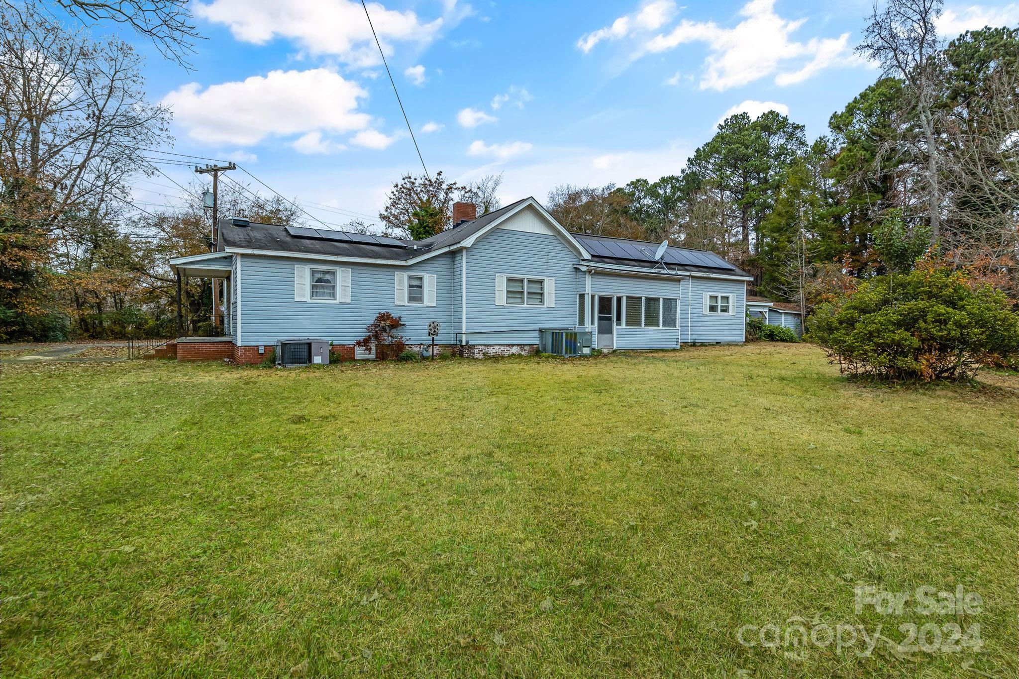 Welcome to this spacious ranch-style 3-bedroom, 2-bath home with endless possibilities! Situated on a half-acre lot in the charming town of Great Falls, SC, this home offers a perfect blend of comfort and potential. With generous living spaces, a functional layout, and a large yard, it's ideal for both relaxing and entertaining. The open-concept design provides plenty of room for customization, whether you're looking to update the kitchen, add outdoor amenities, or simply enjoy the peaceful surroundings. Located in a quiet neighborhood, yet just a short drive to local amenities, this home is perfect for anyone seeking a balance of rural tranquility and convenient access to nearby cities. Sonar Panels included. Don’t miss the opportunity to make this property your own!
