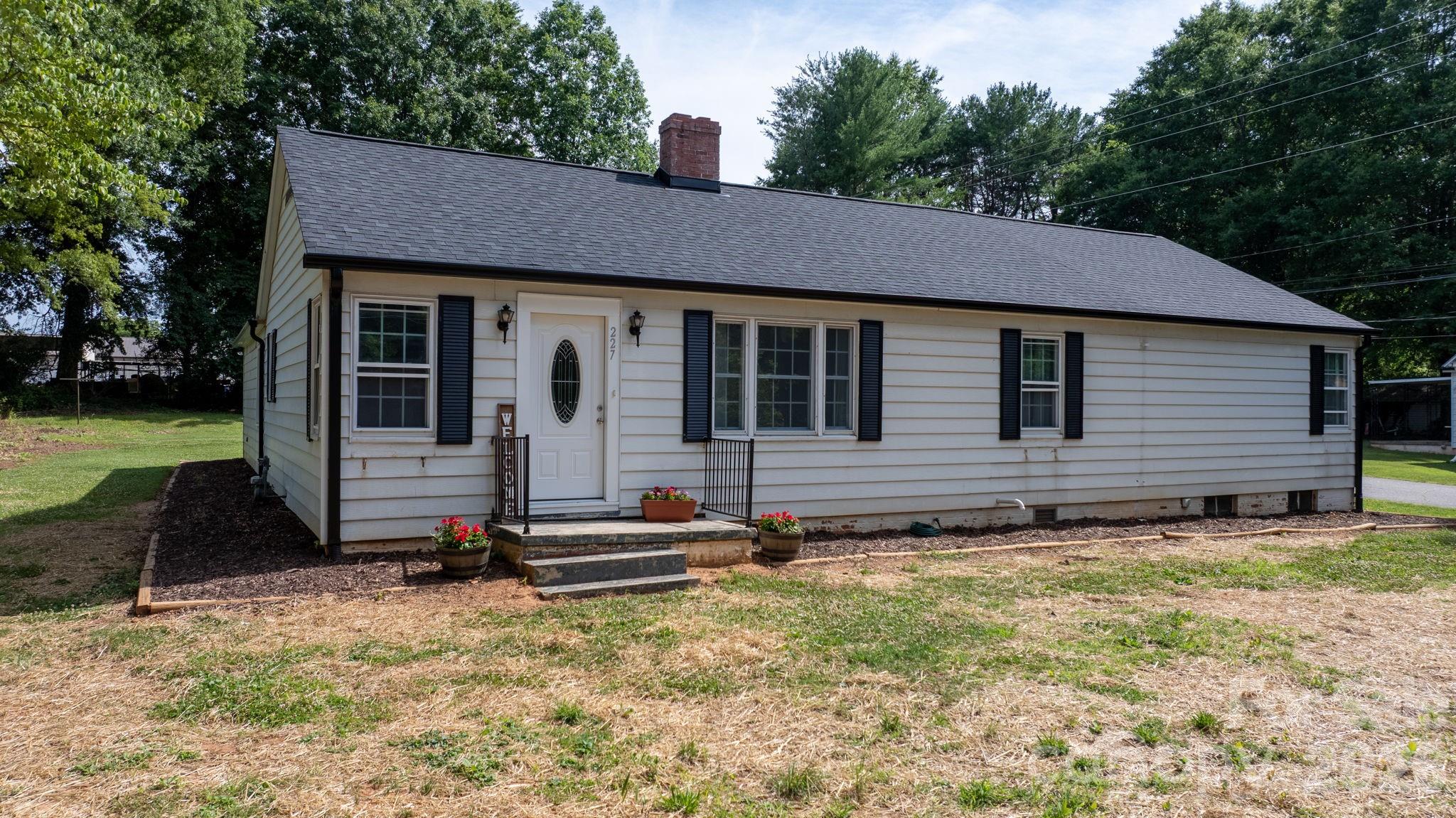 This charming 4BR/2BA Newton home perfectly blends modern updates with classic character. The heart of the home features an updated kitchen, flowing into a dining room rich with original details, including a fireplace with original millwork.

Location is everything here—enjoy ultimate convenience with schools, shopping, dining, parks, and major commuter routes just minutes away.

Outside, relax or entertain on the back patio, featuring a convenient carport. Don’t miss this perfect mix of neighborhood charm, modern comfort, and unbeatable location!