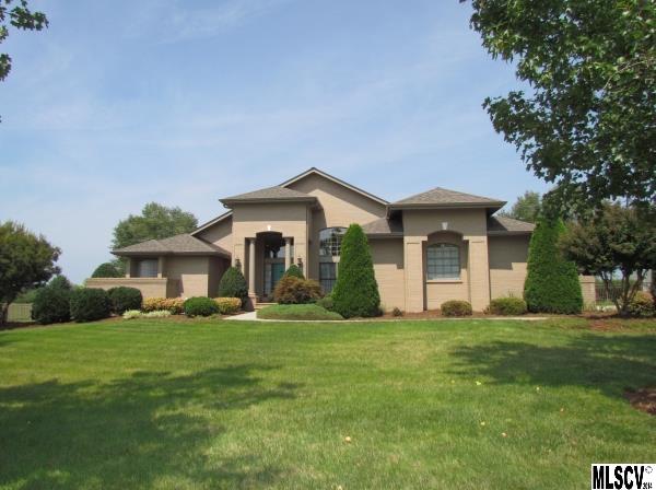 Beautiful custom built home in Rock Barn, on the golf course w/ fenced-in back yard. The 4 BR, 3 BA home is on one level w/a split bedroom & open floor plan. Enter into the large foyer w/ wet bar area & formal dining room. The flow continues into the large open living plan featuring vaulted ceiling & recessed lighting. The LR has gas logs, hdwds & plantation shutters which are featured throughout the home. The kitchen has an abundance of custom cabinet space, eat-at bar, ss appliances, computer desk, wine rack, granite, & pantry. MBR & MBA have his & her closets (1 is a WIC) & MBA has granite, dbl vanity sinks, & sep tub/glass shower. BR 2, 3, 4, & additional 2 full baths are opposite the MBR. The back offers a serene & private patio area w/ wet bar & extensive gardening & views of the course. Home also has a dbl garage, utility room, laundry room, outdoor lighting, security system, intercom & inside/outside surround sound stereo. $2,000 refrigerator conveys with house per seller.