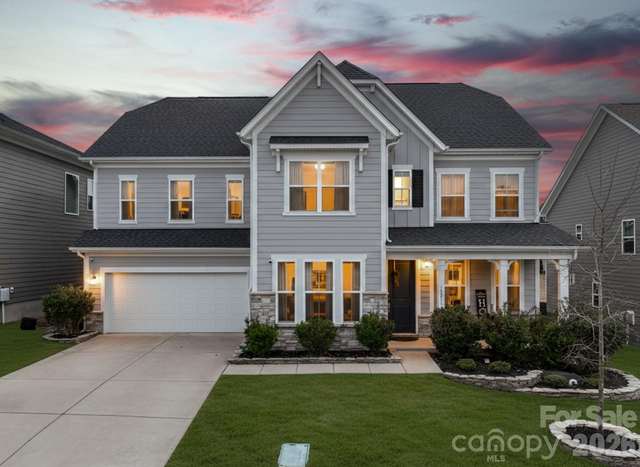 Stunning, model-style home with a heated saltwater In-ground pool and built-in Jacuzzi. Spacious patio featuring an outdoor kitchen and fire pit—perfect for entertaining year-round. Enjoy the screened porch with ceiling fan and a fully irrigated yard for easy maintenance. Permanent track lighting on the exterior of the home that you can control year round via an app.  Inside, you'll find a home office off the foyer with French Doors, a large dining room with built-in cabinets and serving countertop. Open floor plan with a gourmet kitchen including a large island, wall oven, convection microwave, and gas cooktop. A guest bedroom and full bath are on the main floor, while upstairs offers a versatile loft. Custom shelves and wall accent the bonus room. A luxurious primary suite with garden tub, dual vanities, walk-in shower, and large closet. Nestled just minutes from Lake Wylie for all your favorite water activities. This meticulously maintained home is truly move-in ready! Part of the Palisades Community, so you can join for a fee to be a part of the Country Club and Golf Course.