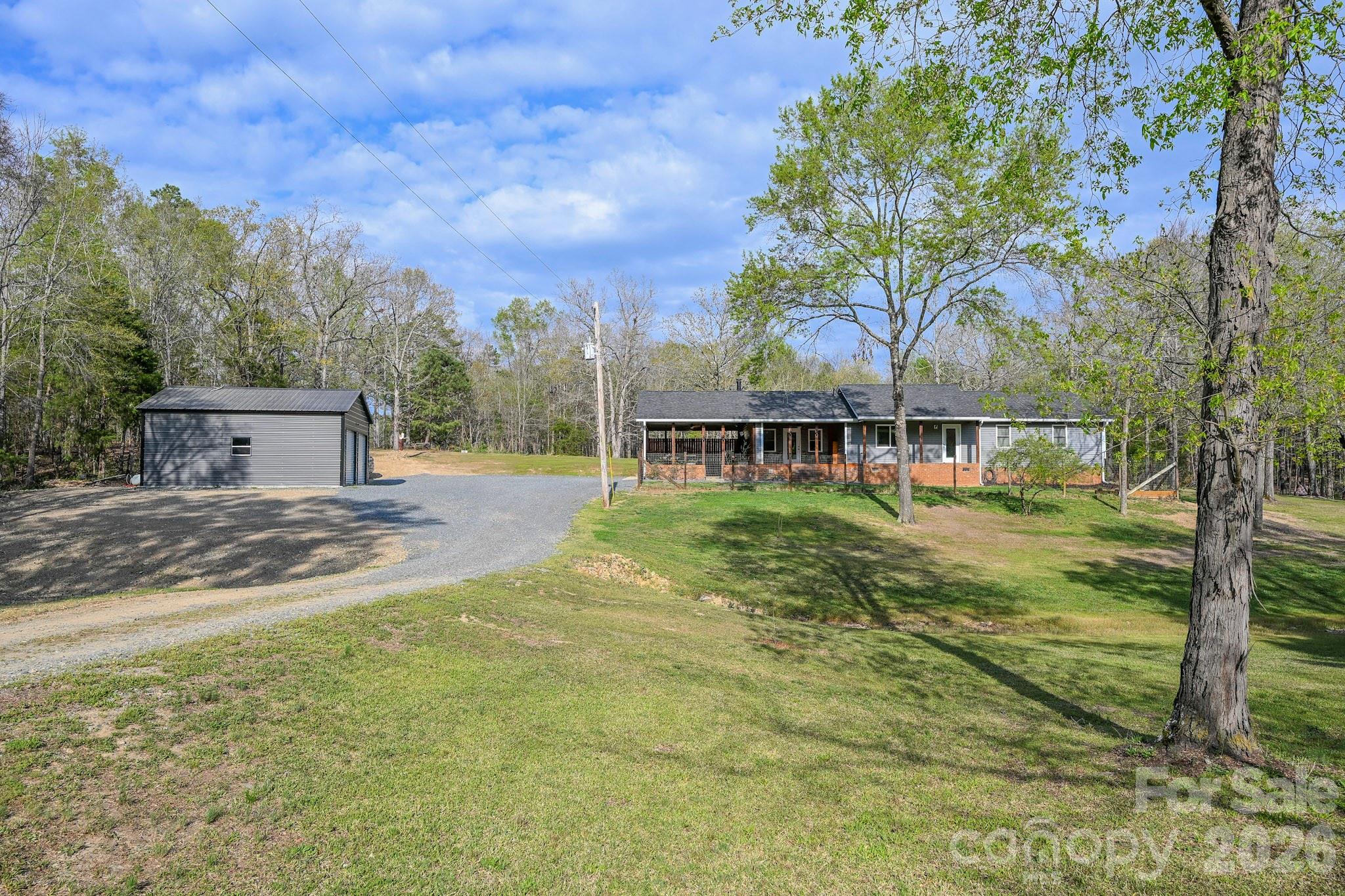 Nestled on over 5.5 beautiful acres, this well-maintained 3-bedroom, 2-bath home offers the perfect blend of privacy and functionality. Surrounded by a large wooded lot, you’ll enjoy peaceful country living on a quiet, low-traffic street.
Inside, the home features a spacious, open dining area ideal for gatherings & everyday living. The layout is comfortable and inviting, with thoughtful upkeep throughout.
Outside, you’ll find multiple features designed for convenience & relaxation. A fenced front area provides a safe space for pets, while the fenced carport area creates a private outdoor retreat perfect for entertaining or unwinding. The property also includes a 24x26 metal building with electrical already started—ready for a workshop, storage, or future customization.
There have been many new items installed on the home over the last few years, from the roof, windows, heat furnace, updated bathrooms, appliances, siding, flooring, and so much more. 
With plenty of room to roam and endless possibilities, this private wooded retreat is a rare find for those seeking space, serenity, and versatility.
