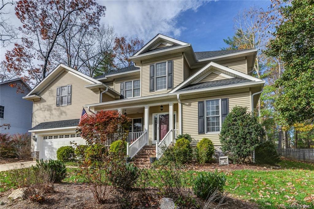HUGE REDUCTION! YOUR CLASSIC BILTMORE HOME awaits! Greet friends from the rocking chair porch then head inside for relaxed elegance with high end finishes throughout. Perfect for families, there is room for everyone with great outdoor living and playing areas. Host friends on the deck; enjoy a book in the sunroom; relish family breakfasts in the open kitchen. Master on main is a luxurious escape after playing in Biltmore Town Square or just coming home from work. Your lifestyle is calling!