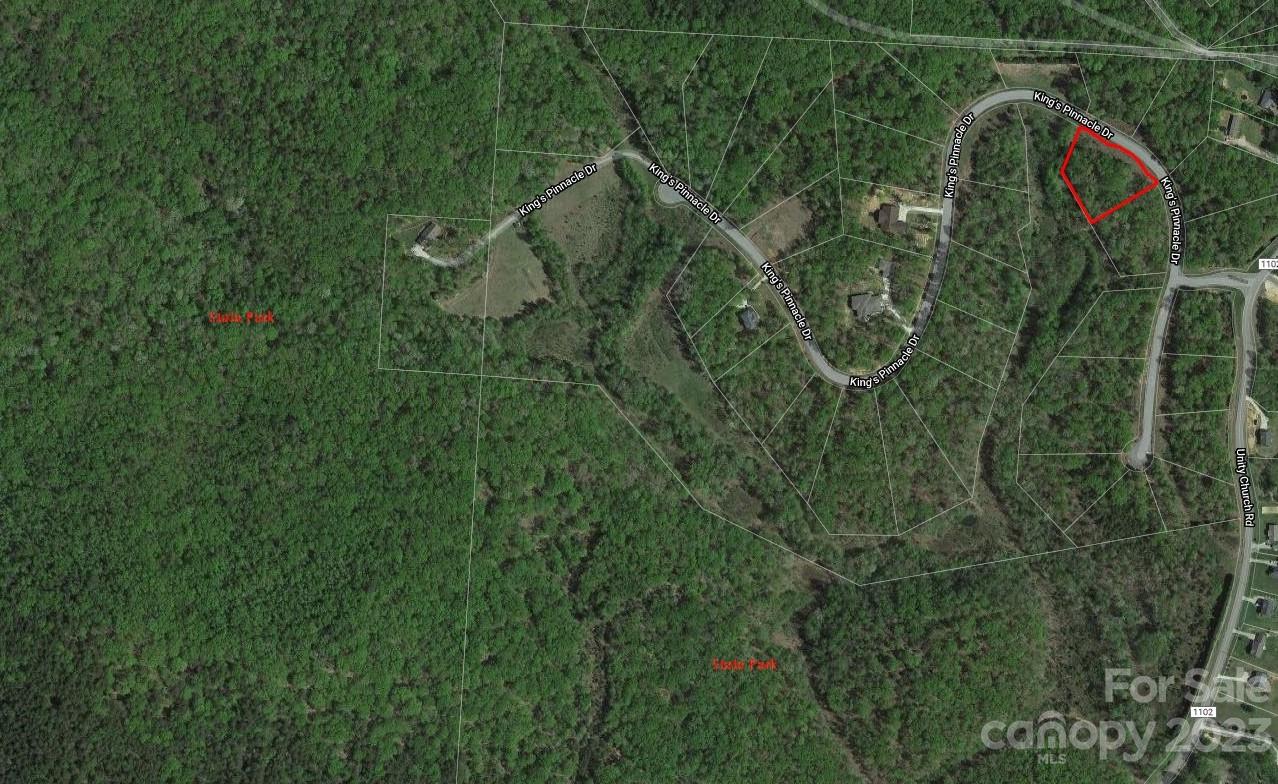 1.14 acre nice wooded lot in the beautiful, secluded, expansive Kings Pinnacle Subdivision with all custom built homes. If you come to visit this subdivision, most likely you will love it! It is ideal to build a custom house with a basement.  It is is only 6 miles or 8 minutes to the new Catawba Two Kings Casino. It is one of the best lots in the subdivision. Do not let it go.