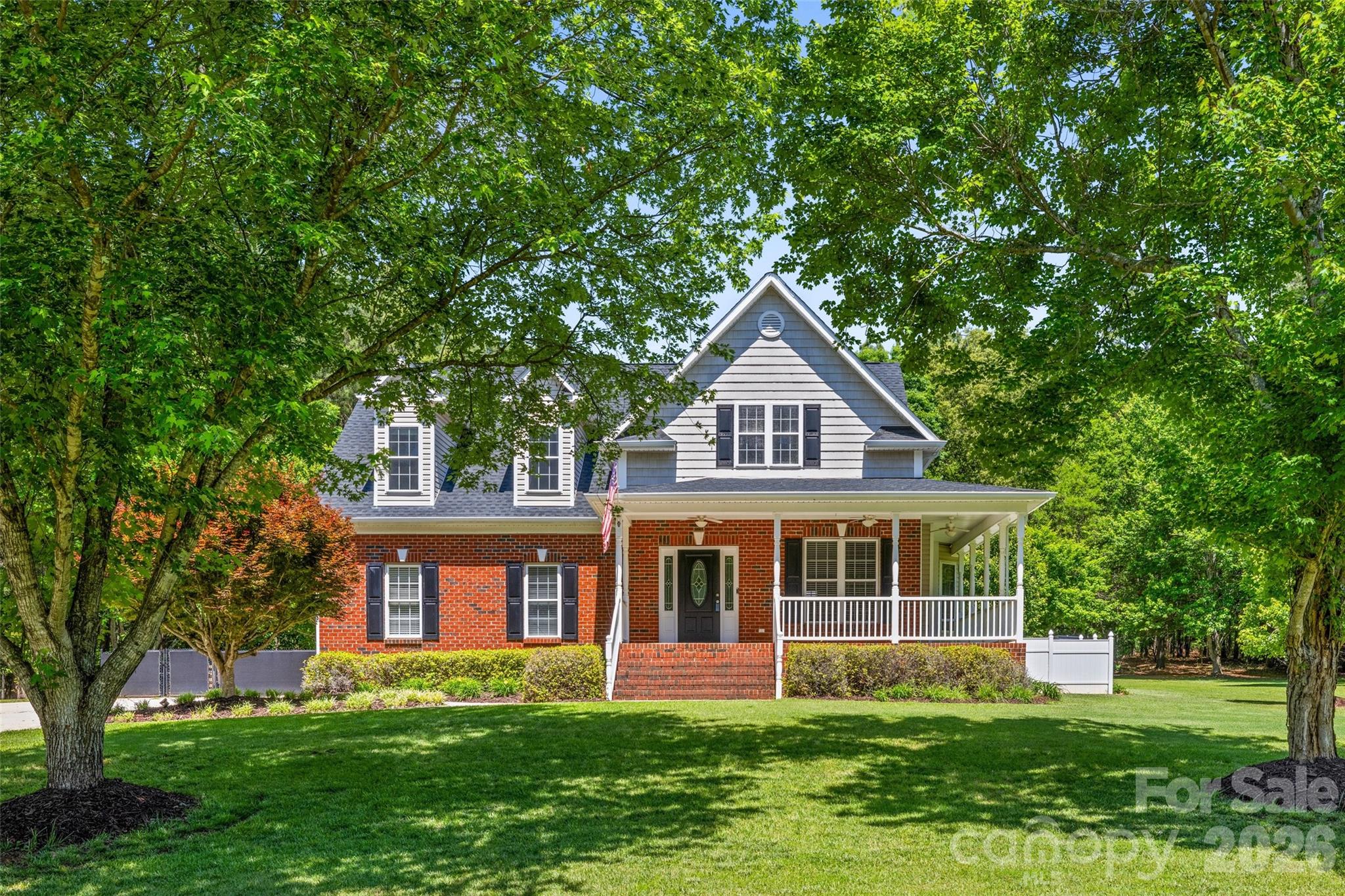 Stunning and Private setting, two-story home on 2 acres in Derby Downs! New Roof/gutters installed in 2024.  The well was redrilled and replaced with 1" piping and filter and pump were replaced in 2021.  This beautifully maintained site-built home features soaring cathedral ceilings, a gas log fireplace in the great room, and an inviting wrap-around front porch perfect for enjoying the outdoors.  The spacious kitchen boasts generous cabinetry, ample counter space, and quality appliances and pantry space. The main-level primary suite offers convenience and privacy, with 3 additional bedrooms upstairs.  Downstairs utility room comes with washer/dryer and has laundry tub/countertop area. Step outside to your private backyard oasis featuring a large composite deck, 16' x 33' in-ground/heated pool (Installed in 2021) and hang out under the wired electric gazebo ideal for entertaining, watching TV and relaxing. Enjoy your summer in this fabulous back yard that is designed for effortless outdoor entertaining. There is an additional building/workshop (with lean to in back) for pool supplies, gardening tools or hobbies.  Part of the backyard has black chain link fencing with plenty of room outside for gardening.   Additional highlights include an attached 2-car garage, walk-in closet(s), beautiful hardwood floors and fresh paint throughout. A rare find — schedule your private showing today!