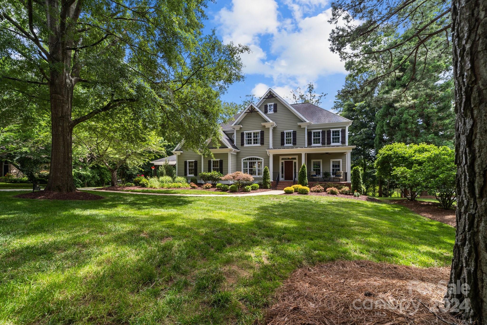Deadline of 7pm (today) on offers.  Thanks.   Walk/bike to town from this beautiful cul-de-sac home near the greenway.  Great curb appeal is accentuated by the trim details, car port and rocking chair front porch.  Functional floor plan allows for main floor living with natural light in abundance in the 2 story great room.  Incredible screened porch with fireplace coupled with a sizable deck for outdoor living.  The large lot allows for many recreation opportunities.  Convenient to Davidson College and Historic Downtown Davidson with its restaurants, boutiques and farmers market.