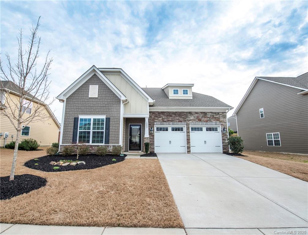 While a home with an exceptional owners' suite is great, one with TWO is even better! This immaculate 4 bedroom 3.5 bath with an outdoor kitchen is a fabulous layout with all of the right spaces. An open floorplan with wood floors, gas stove in a spacious kitchen equipped with ample cabinets and granite countertops for days, looks into the living room and breakfast nook that leads out to the tranquil outdoor living space. The owners' suite downstairs has a tray ceiling, crown molding, a separate shower and soaking tub in the large master bathroom with his and her sinks and a massive walk in closet. Off of the loft area upstairs you will find a second owner's suite that is large enough to fit any size bedroom suit. You will also find a storage closet, two additional bedrooms and a guest bath. The outdoor living space includes an enlarged stone paver patio area with a built in grill and terrace. This house truly has it all!