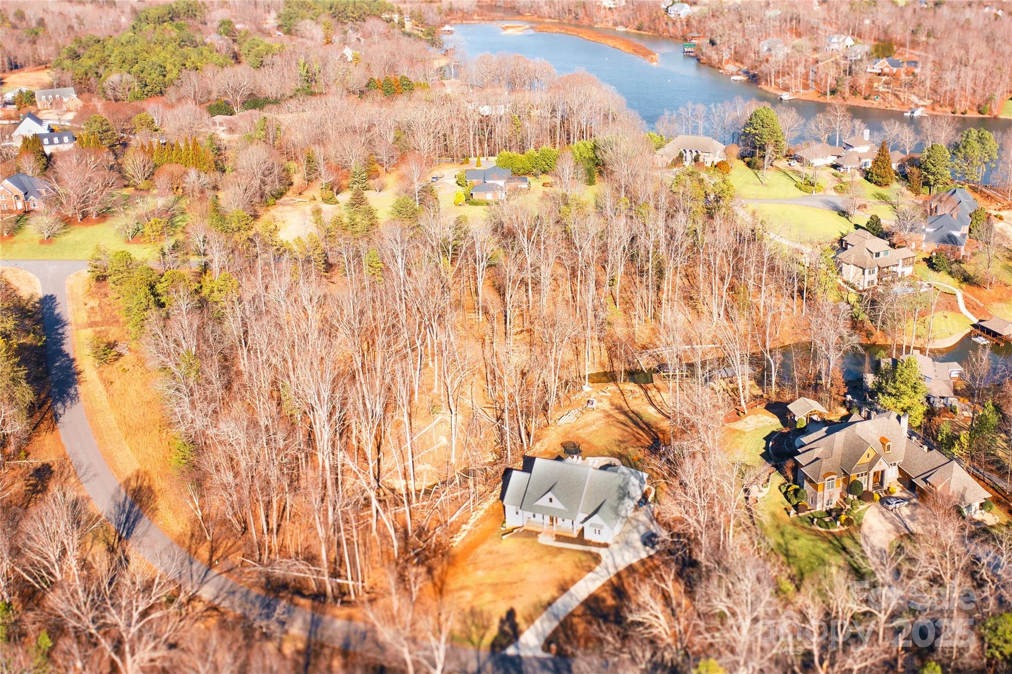Beautiful lot located in Dogwood Shores community on Moss Lake.  4 BEDROOM SEPTIC PERMIT APPROVED. This property is waiting for you to build you dream home in a wonderful community at Moss Lake.  Minutes from Shelby and only 45 minutes to Charlotte International Airport.  This corner lot is 1.757 Acres with ~650 of road frontage. Creekfront with lake views.