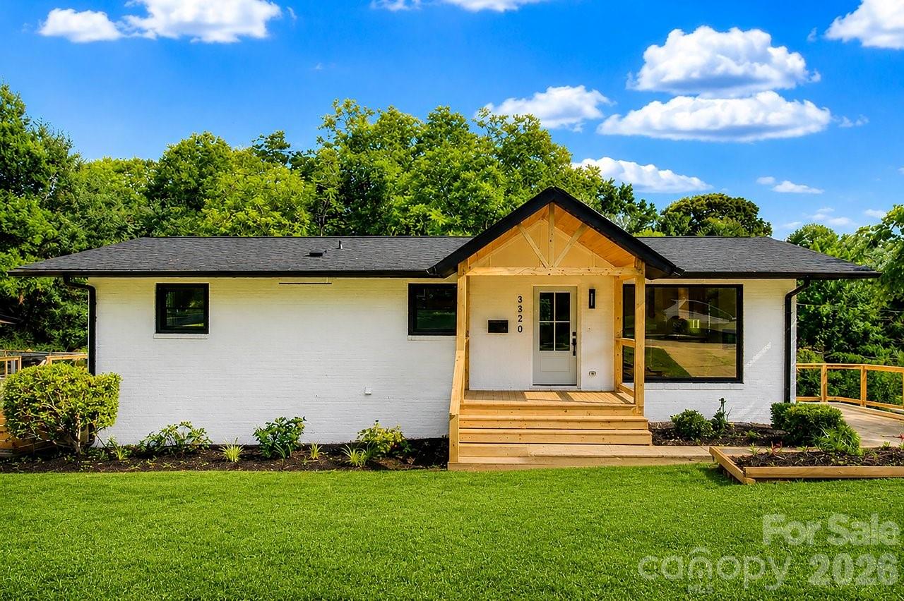 Outstanding value in Sheffield Park. This home is minutes to Plaza Midwood! From the moment you arrive, the charming curb appeal makes an impression. The inviting gabled front porch sets the tone, creating the perfect place to relax and enjoy the peaceful, tree-lined surroundings of the neighborhood. Inside, the home has been beautifully renovated with a designer’s eye for detail. The stunning kitchen serves as the heart of the home, featuring an oversized island ideal for gathering, warm wood cabinetry that adds character and depth, and a layout that makes both entertaining and everyday living effortless. The primary suite is a true retreat, highlighted by a spa-inspired bathroom with a standalone soaking tub, a custom glass-enclosed shower, elegant
tilework, and a walk-in closet with built-in shelves that gives the space a refined, luxurious feel. Downstairs, the finished basement provides incredible versatility—perfect for a media room, playroom, or additional entertaining space. You’ll also find a spacious, light-filled laundry room that turns an everyday task into a surprisingly enjoyable experience. Beyond the design and functionality, this home offers true peace of mind with major system upgrades already completed. Enjoy the benefits of a new roof (2025), new HVAC (2025), new windows, fresh interior and exterior paint, a new water heater (2026), updated plumbing & electrical, and more—giving you confidence in both the beauty and the integrity of the home. Step outside to enjoy the expansive rear deck, an ideal setting for morning coffee, weekend gatherings, or simply soaking in fresh air. The generous backyard offers plenty of space for your enjoyment. Homes like this don’t come along often. Located in a neighborhood known for its parks, tree-lined streets, sporting courts, and walking trails, you’ll also love being just minutes from Plaza Midwood and some of Charlotte’s favorite local restaurants, shops, and entertainment. This might be Charlotte's best-kept secret!