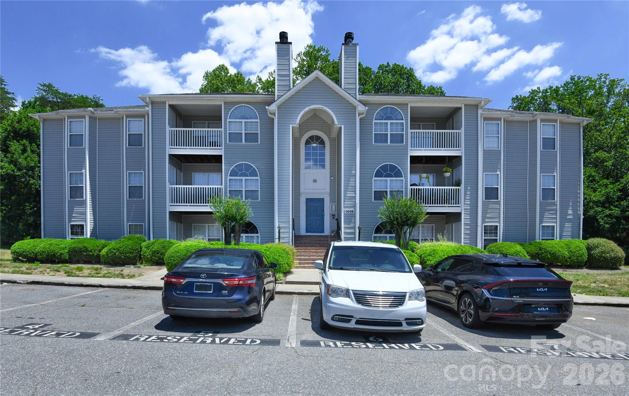 Welcome to 5008A Lawndale Drive! This charming first-floor condo offers comfort, convenience, and easy living in Greensboro. Step inside to find new LVP flooring throughout, fresh interior paint, and new blinds that give the home a clean, refreshed feel. The living room features a fireplace and flows nicely to a private patio, perfect for relaxing outdoors. The primary bedroom features its own en suite bathroom for added privacy and convenience. Additional features include a laundry room, first-floor access, and a low-maintenance layout ideal for an owner occupant or investor. Conveniently located near shopping, dining, parks, major highways, and all that Greensboro has to offer.