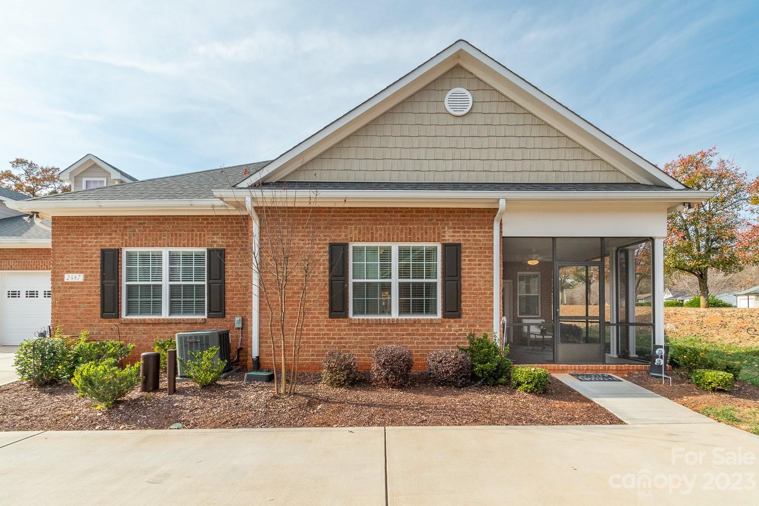 Welcome Home to your stunning, low maintenance townhome located in highly sought after active adult community of 3 Cherry Way.  With 2 bedrooms, 2 baths, a dining/multipurpose room & sunroom, this home boasts 9ft ceilings,  tray & vaulted ceilings, w/lvp flooring running through great room & primary suite. The upgraded kitchen features ceramic tile backsplash, quartz counters, stainless appliances, soft close cabinets w/pull out bottom drawers, upgraded fixtures, electric cooktop & lots of storage. The dining area chandelier is a beautiful upgrade. You will  love the upgraded luxury vinyl tile. Also included is a huge walk up storage that can be finished adding living space, with tankless hot water heater. The two car garage features a utility sink. Socialize with your neighbors at the community's saltwater pool/pickleball court, or enjoy the many events hosted by the active Event Planning team at the clubhouse.